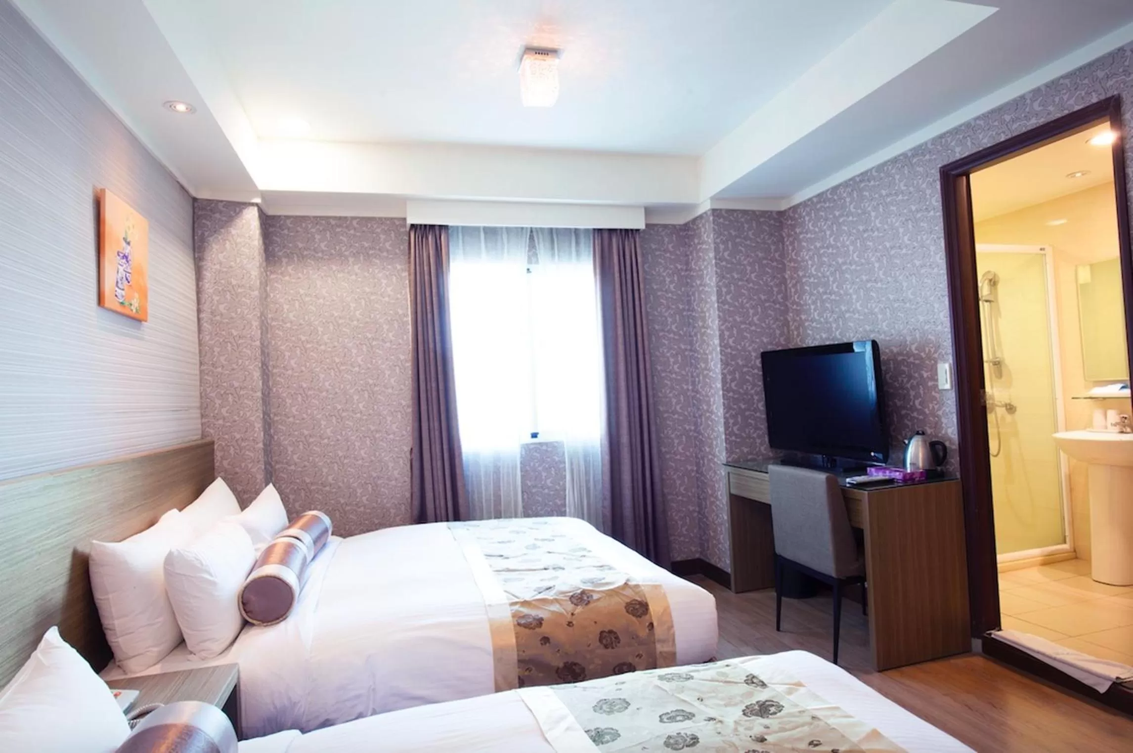 Bed in True Friend Hotel