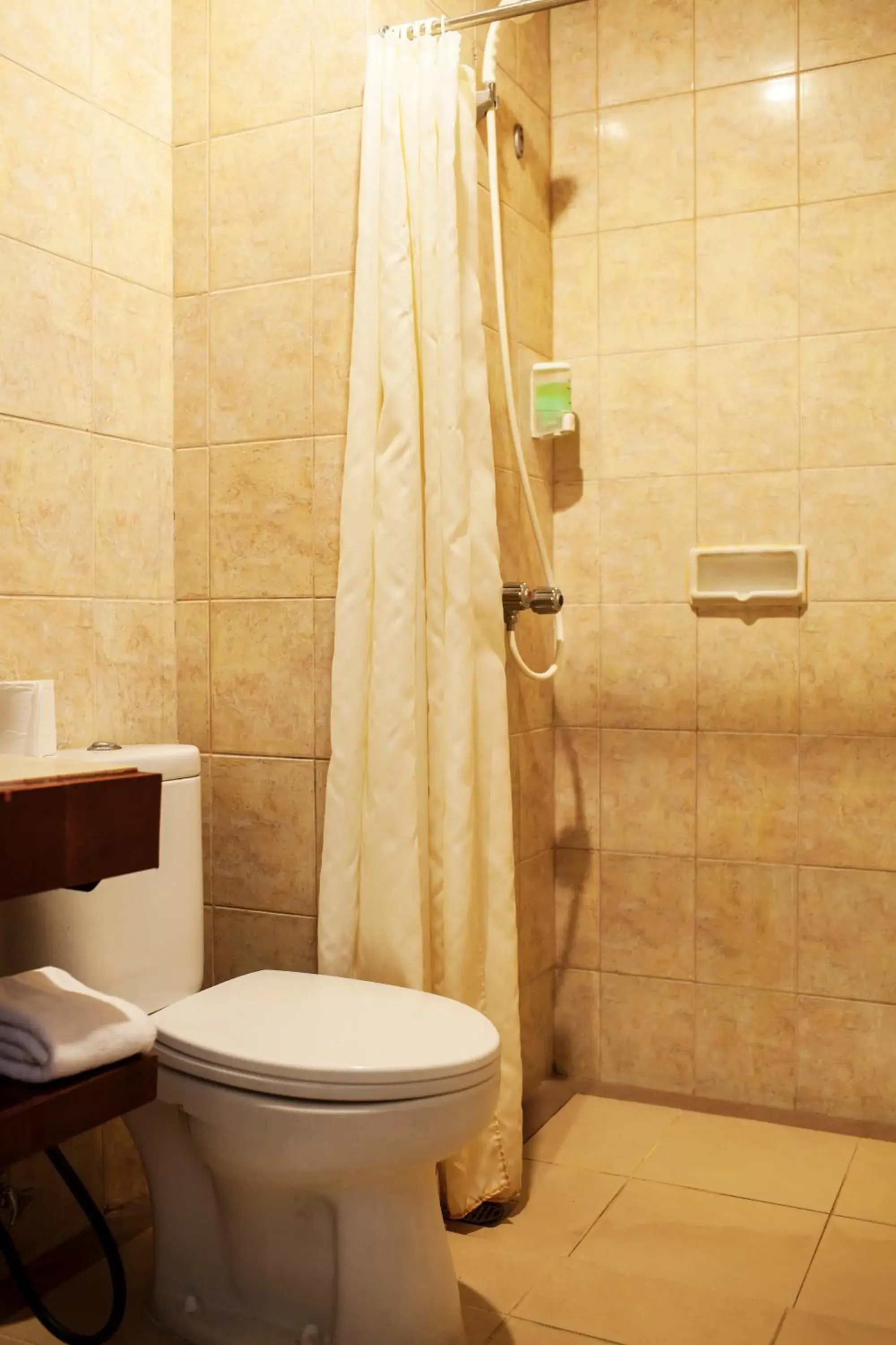 Property building, Bathroom in Grand Kuta Hotel And Residence
