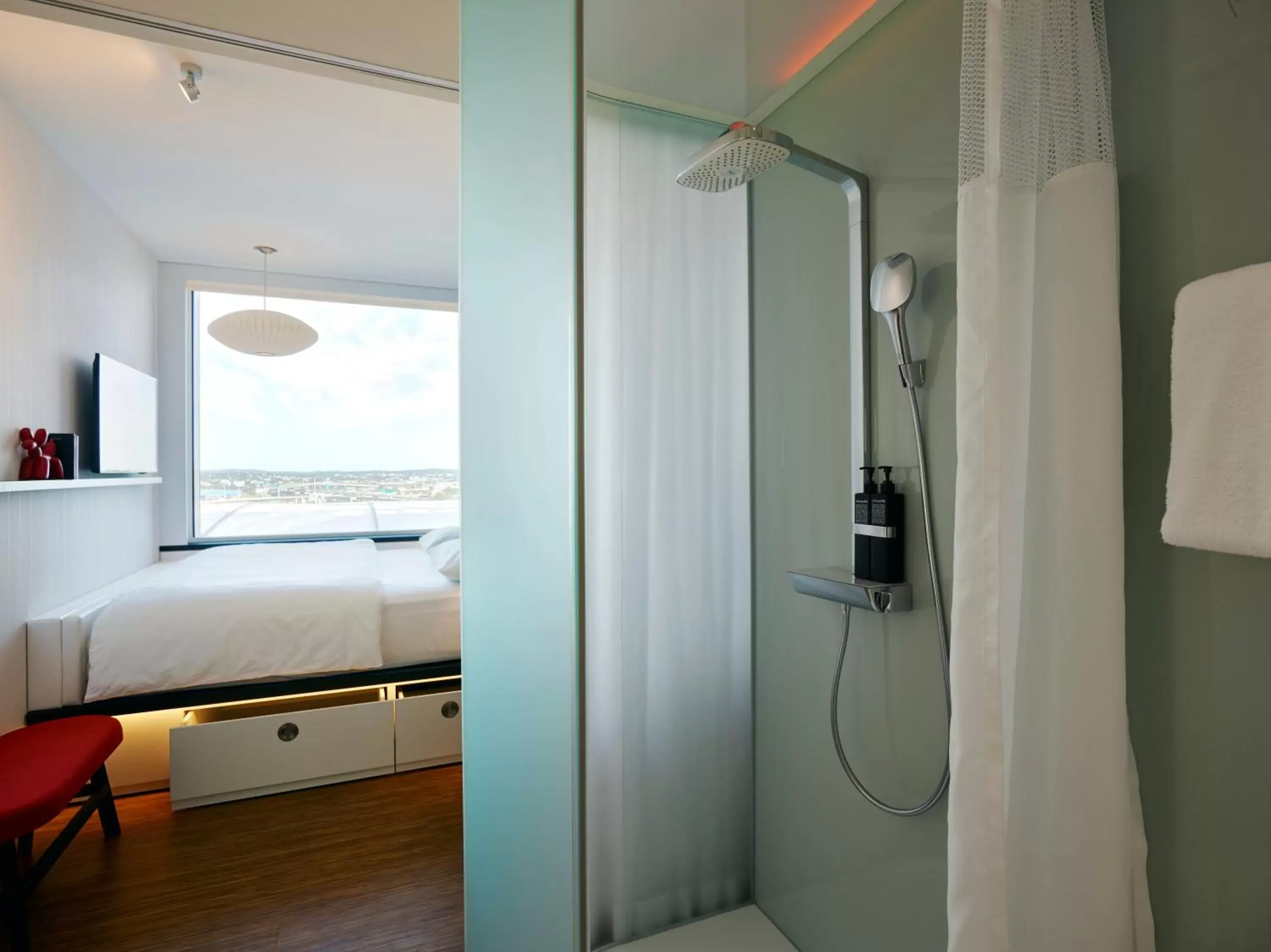 Shower, Bed in citizenM Boston North Station Shower, Bed in citizenM Boston North Station