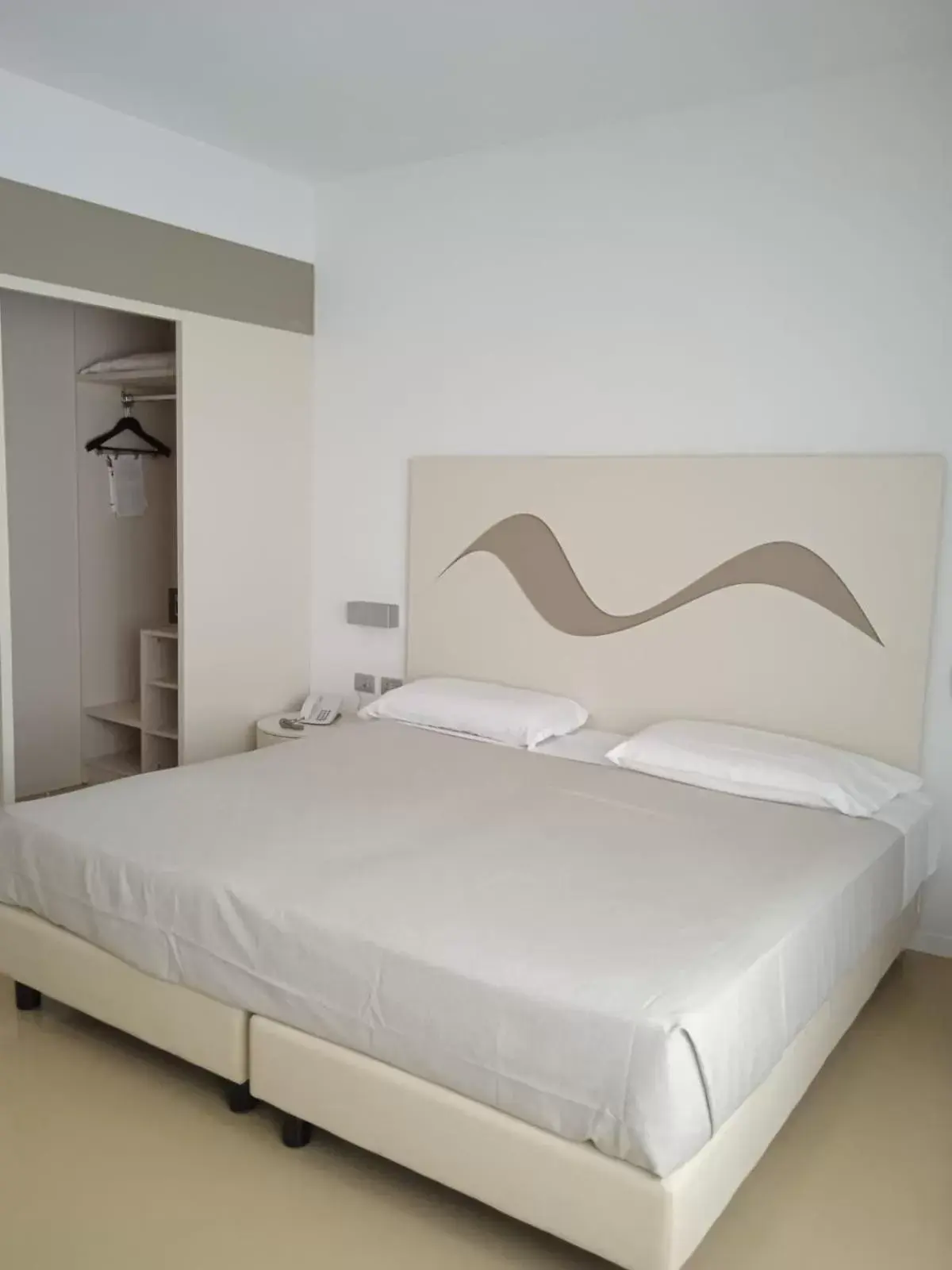 Bed in Hotel Poseidon