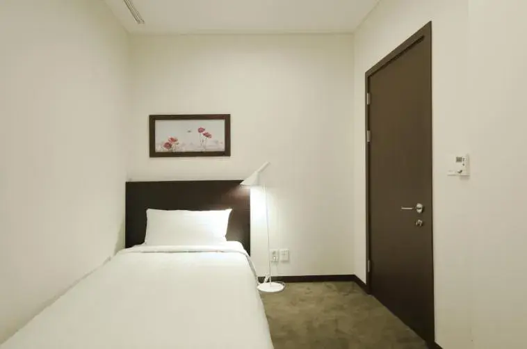 Bed in Orakai Insadong Suites