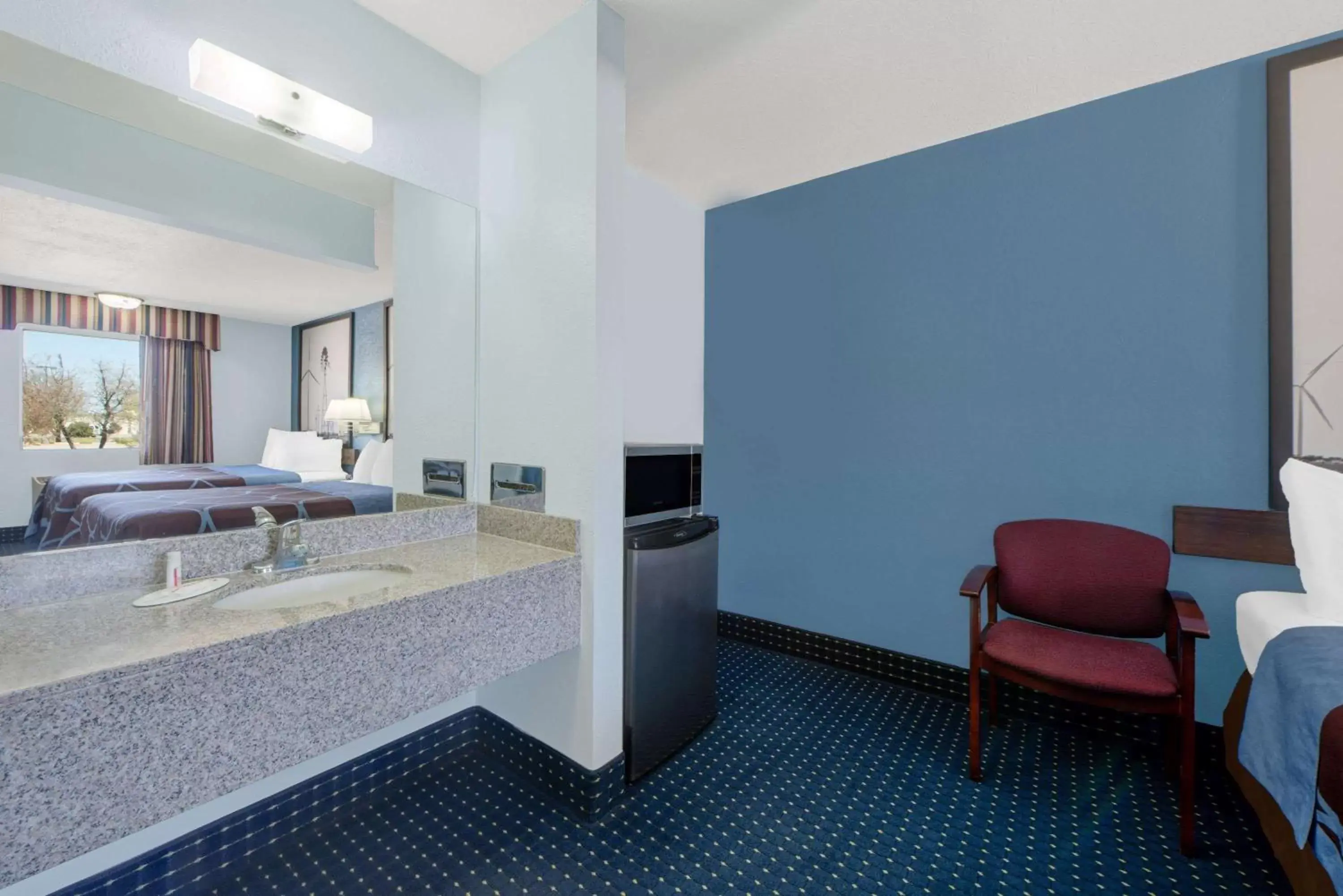 Photo of the whole room, Bed in Super 8 by Wyndham Dumas TX Photo of the whole room, Bed in Super 8 by Wyndham Dumas TX