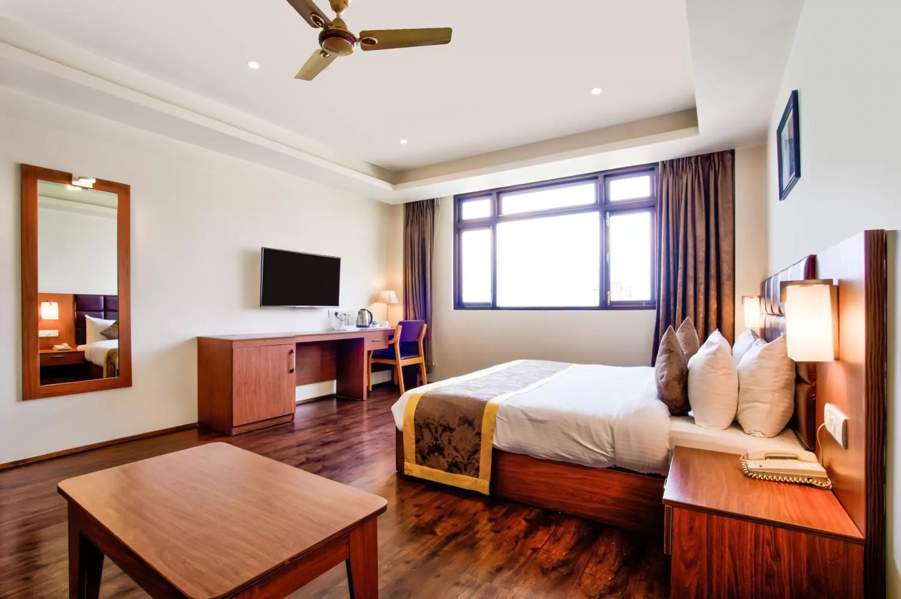 Bed in Summit Ttakshang Residency Hotel & Spa