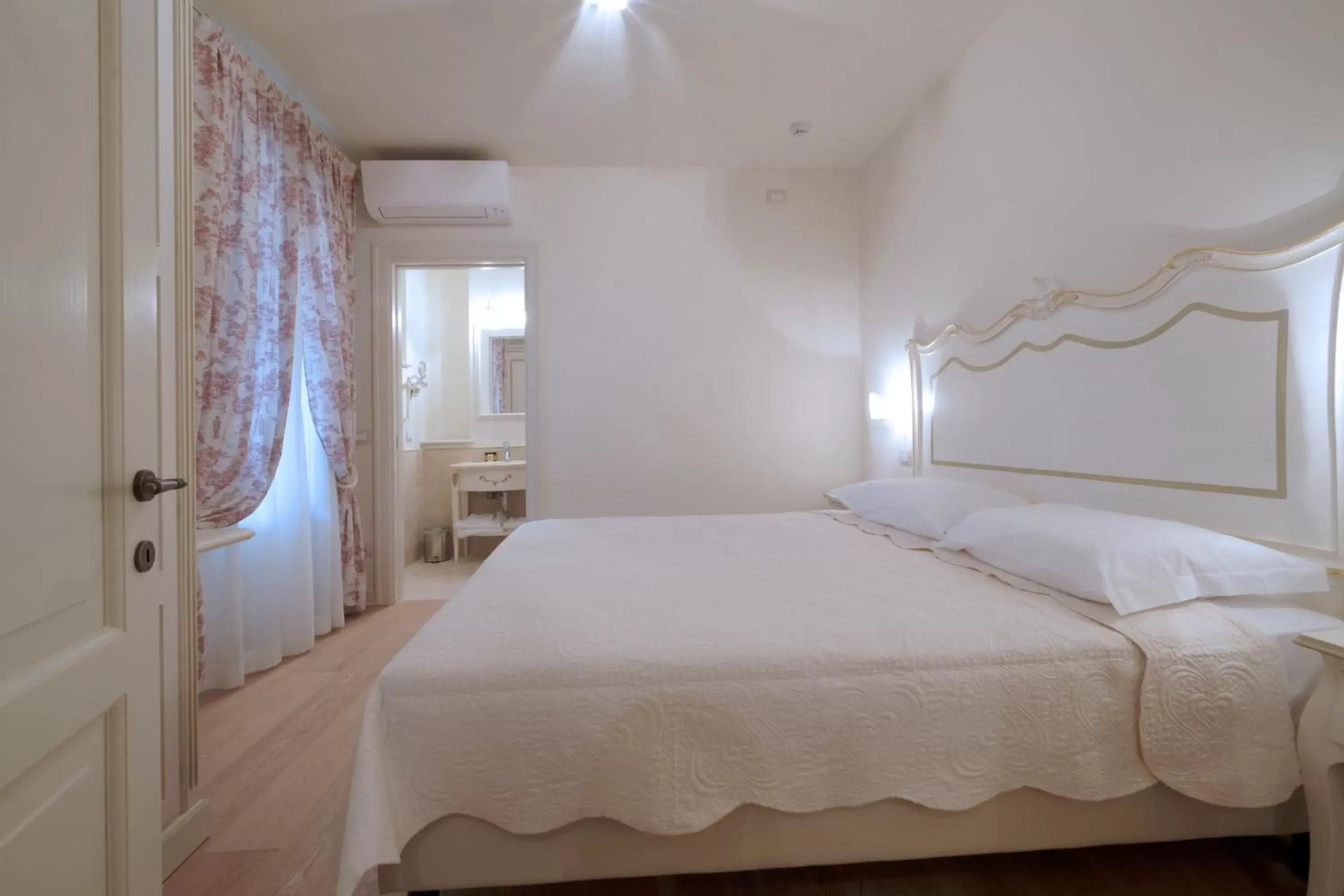 Bed in Garda Apartments San Vigilio Golf Bed in Garda Apartments San Vigilio Golf