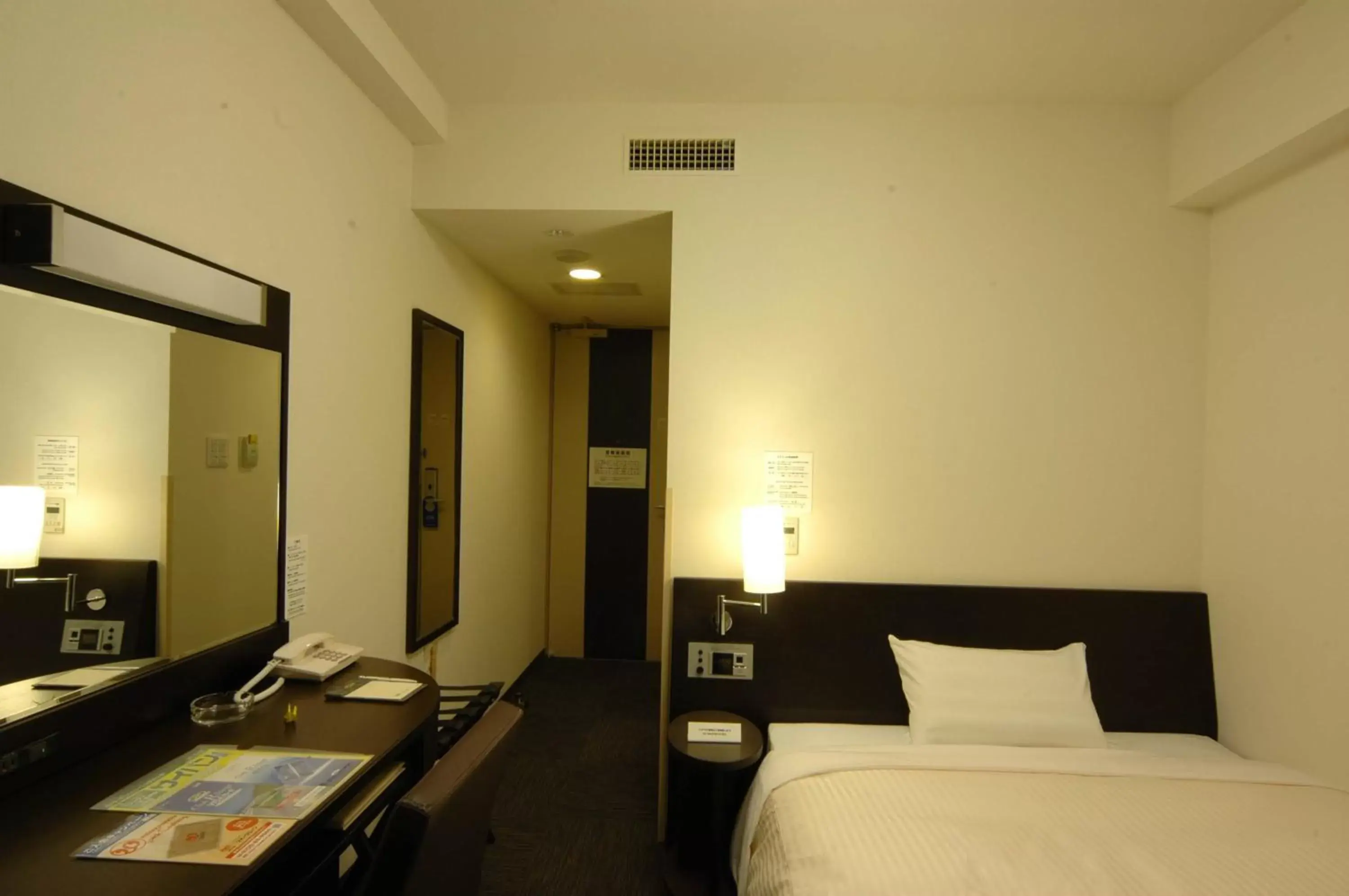 Photo of the whole room, Bed in Hotel Route-Inn Kushiro Ekimae