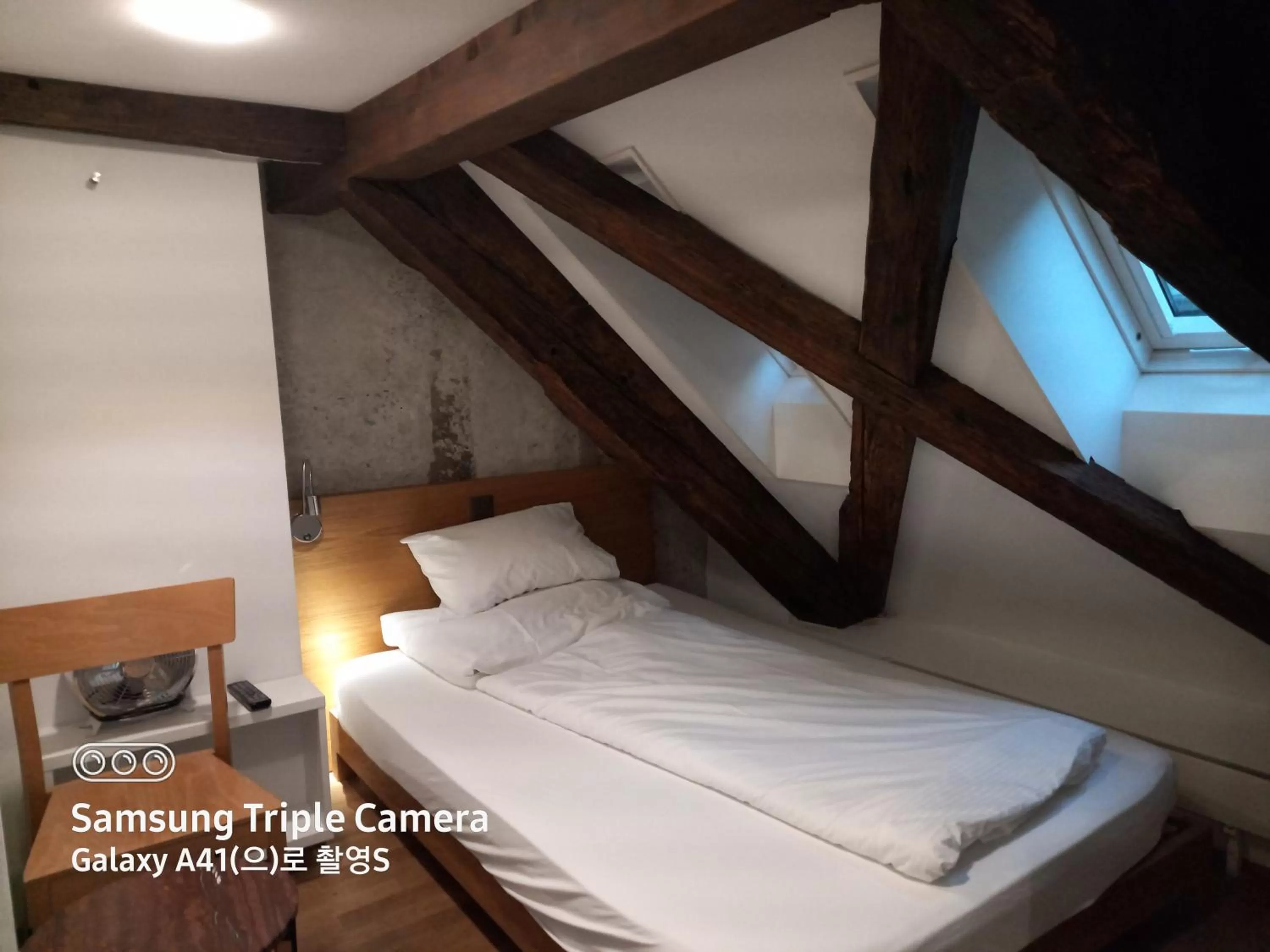 Bed in Hotel Lestelle - self check-in