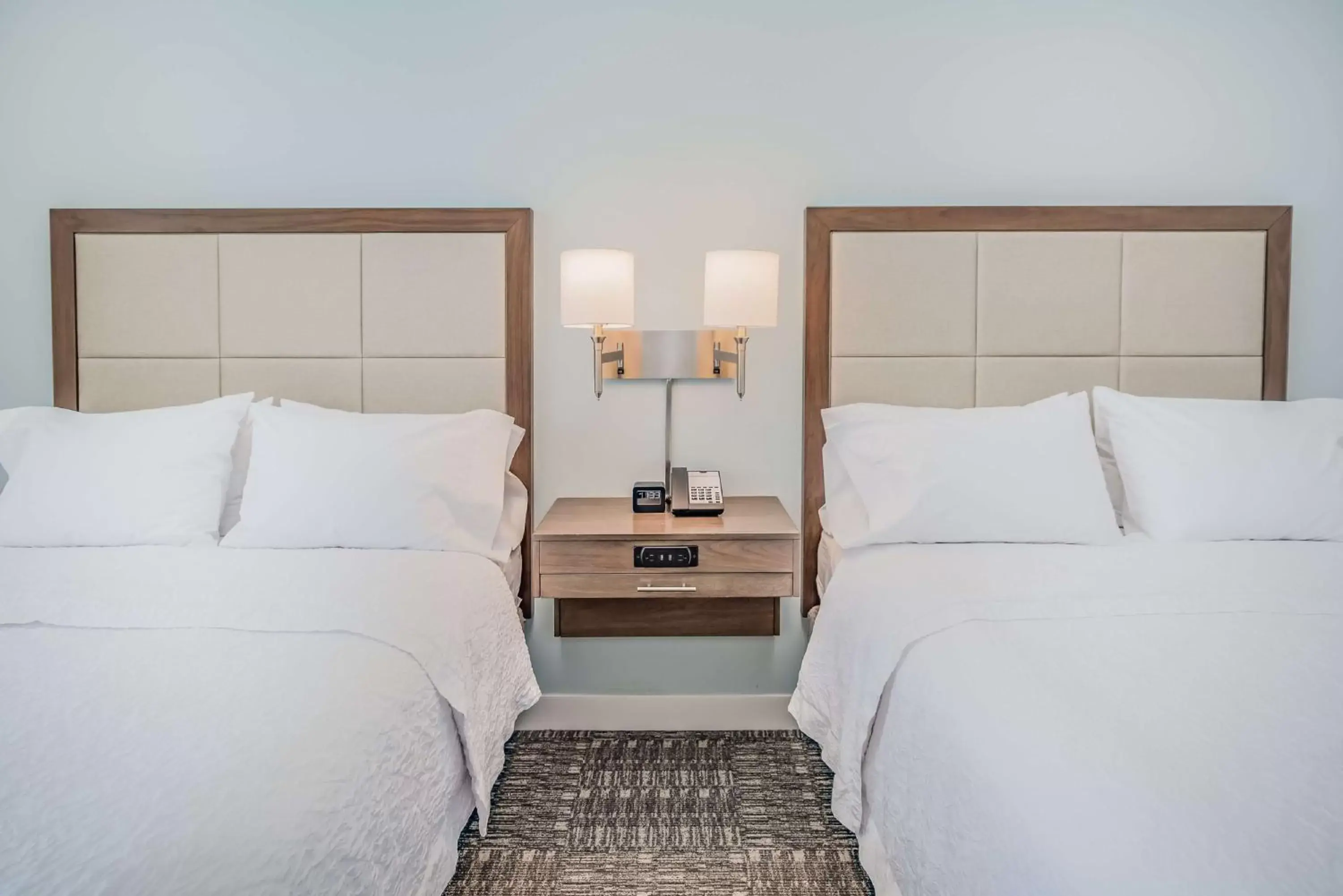 Bed in Hampton Inn & Suites Panama City Beach-Beachfront