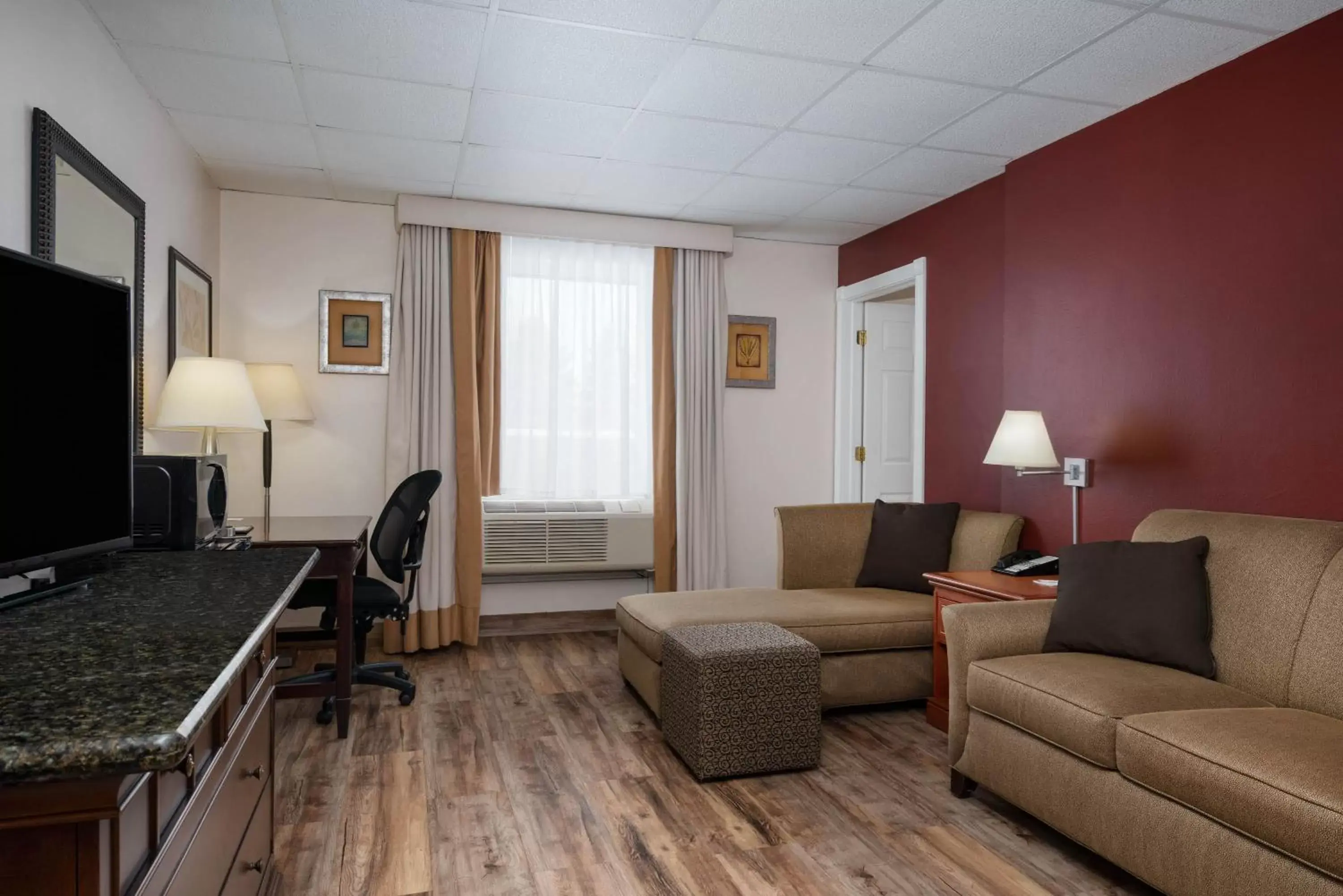 Living room in Ramada by Wyndham Albert Lea Living room in Ramada by Wyndham Albert Lea