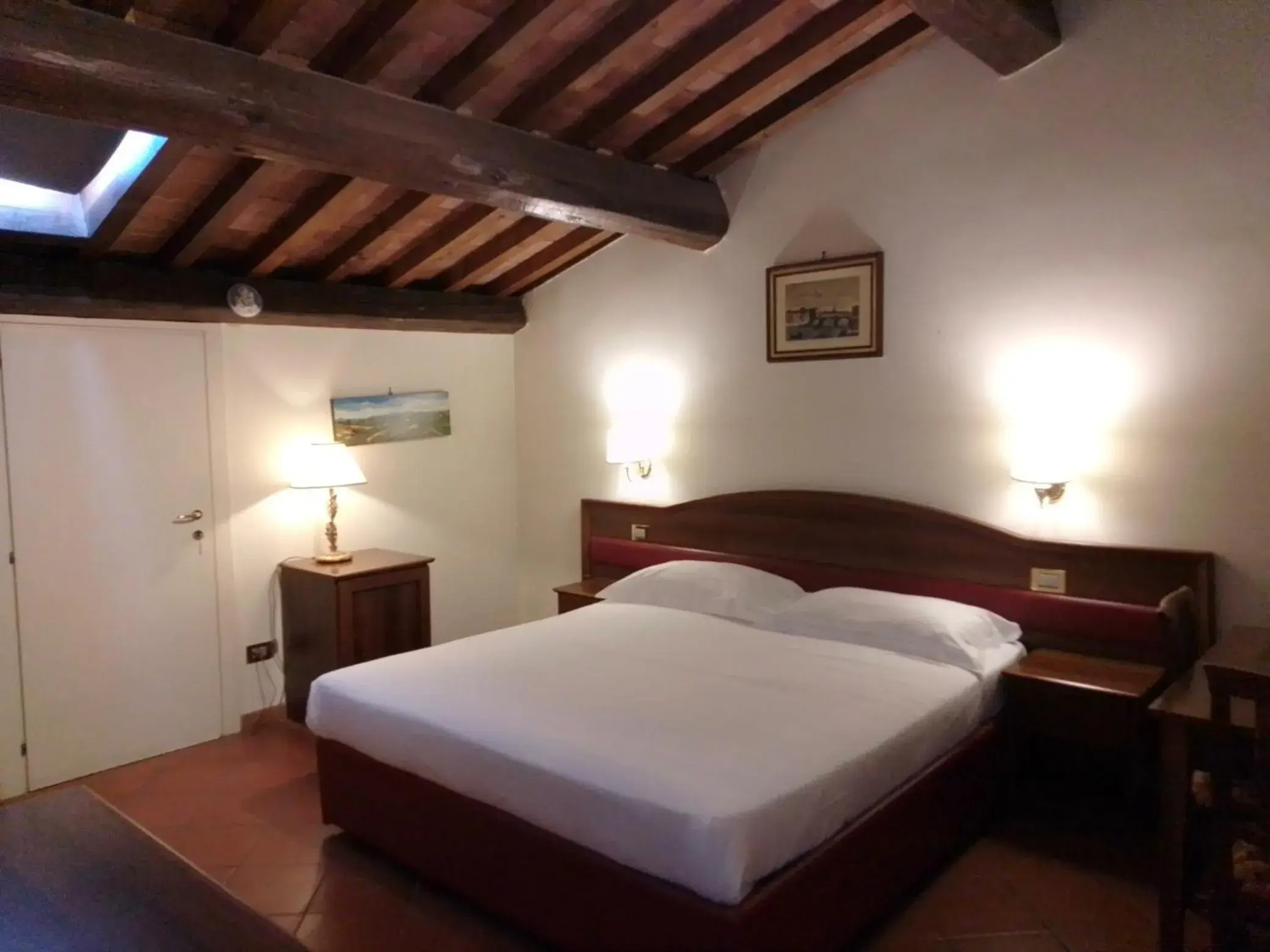 Photo of the whole room, Bed in Relais La Corte di Cloris Photo of the whole room, Bed in Relais La Corte di Cloris