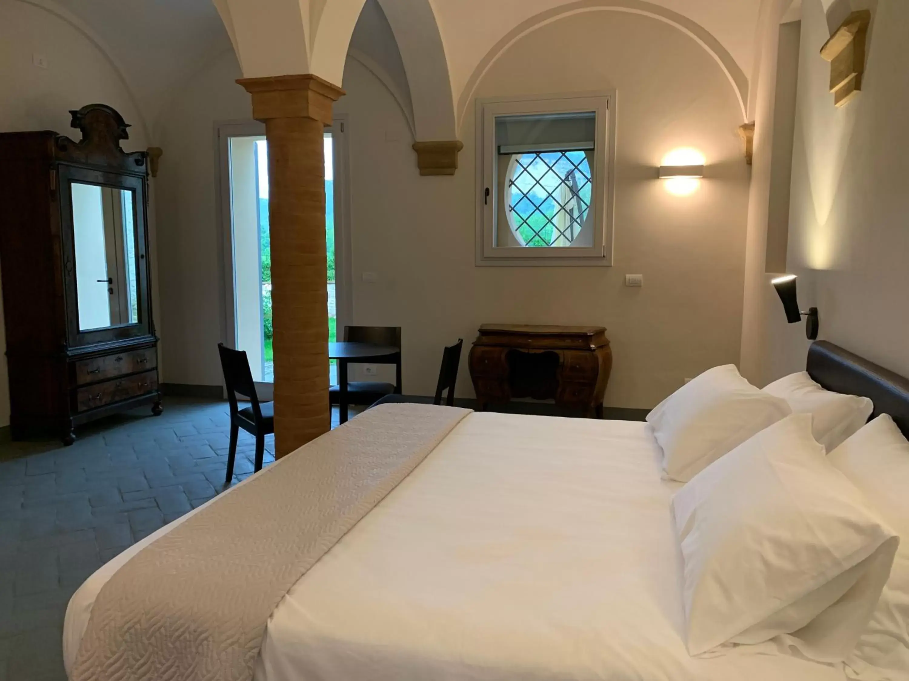 Bed in PALAZZO DE' ROSSI HOTEL