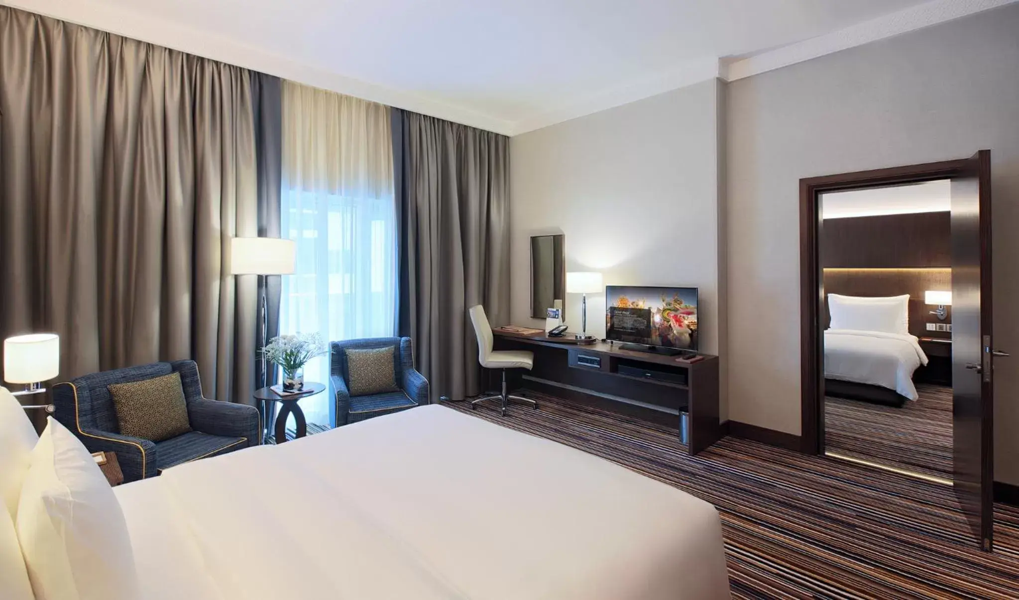 Bed in Dusit D2 Kenz Hotel Dubai
