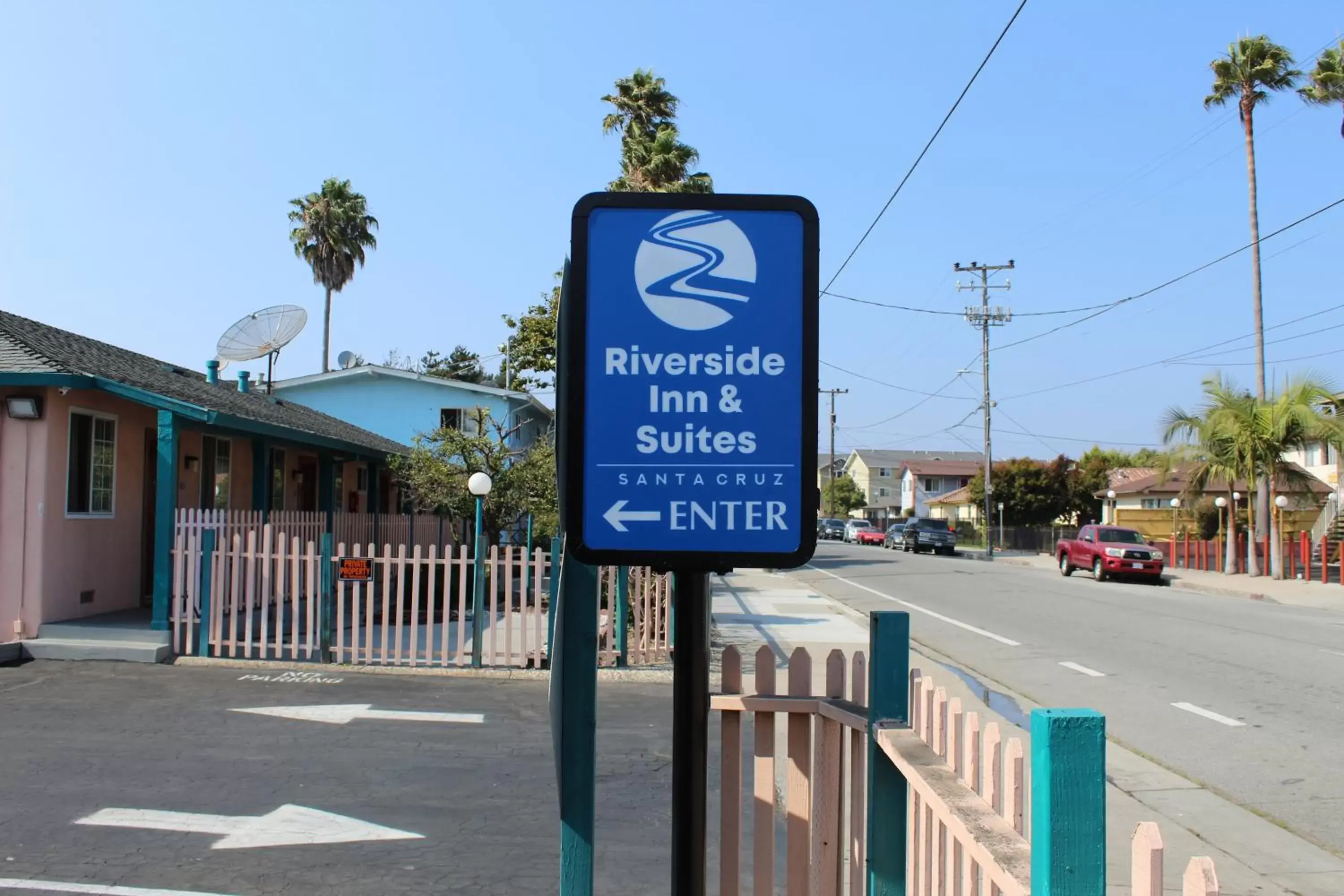 Property logo or sign in Riverside Inn & Suites Santa Cruz