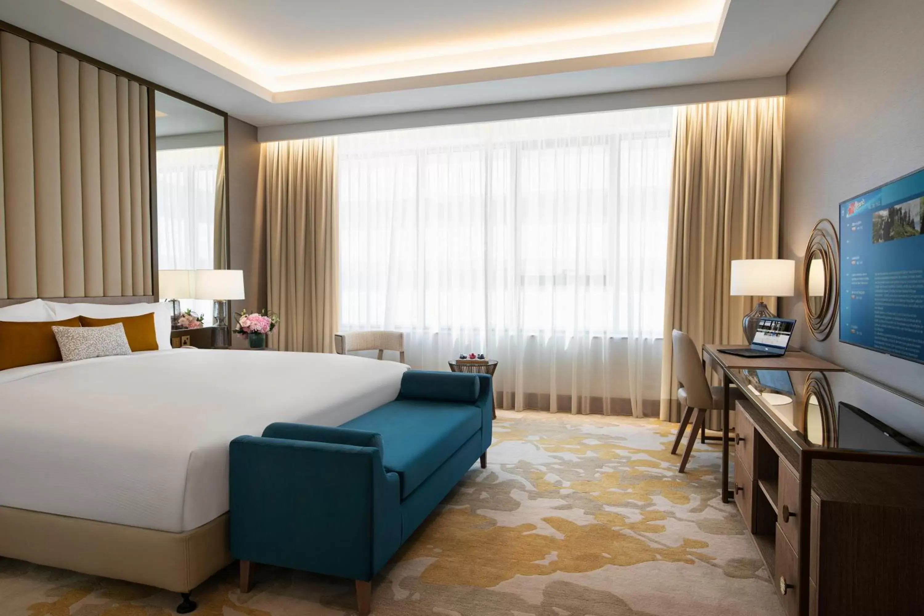 Bed in Al Jaddaf Rotana Suite Hotel