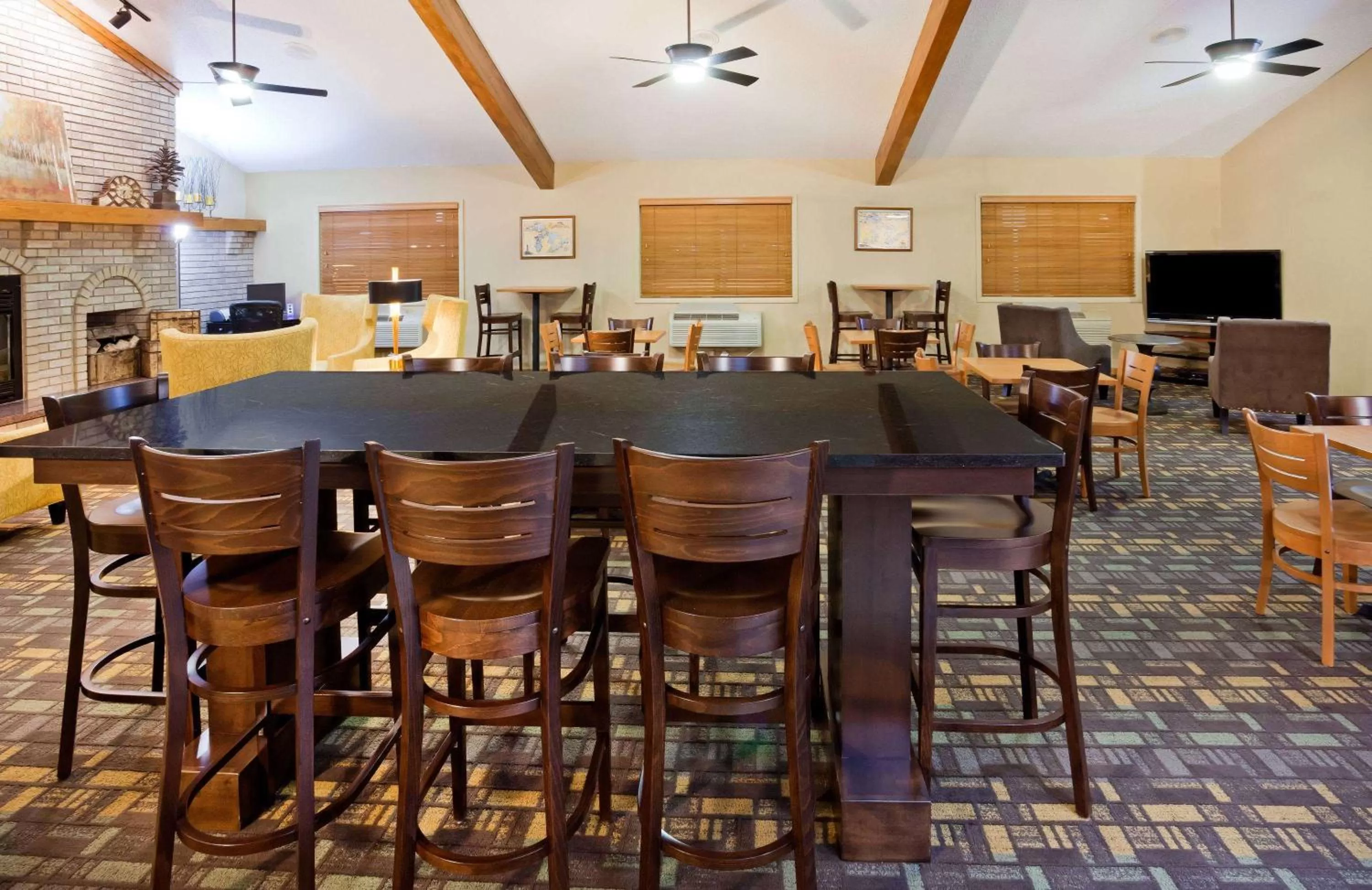 Seating area in AmericInn by Wyndham Ironwood