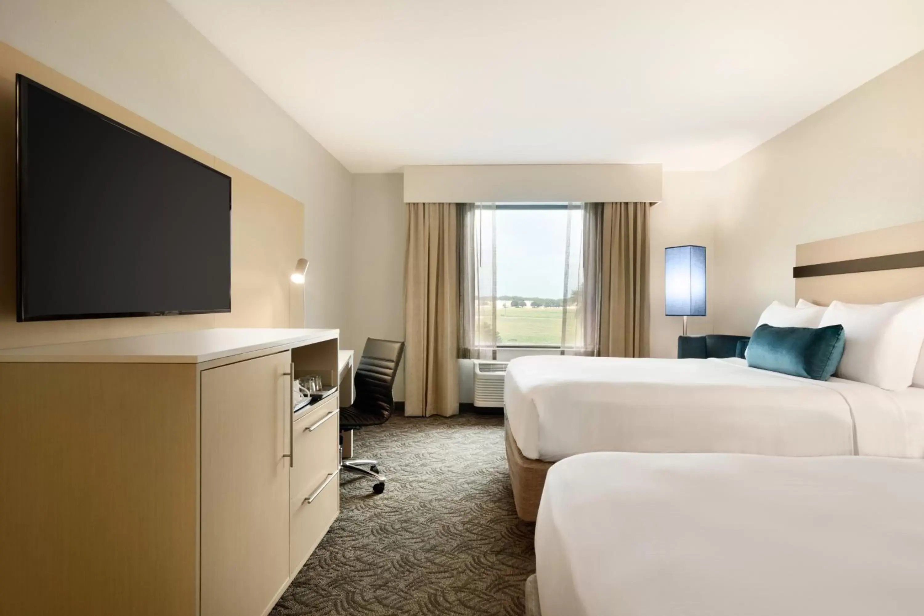 TV and multimedia, TV/Entertainment Center in Holiday Inn - Bloomington - Normal, an IHG Hotel