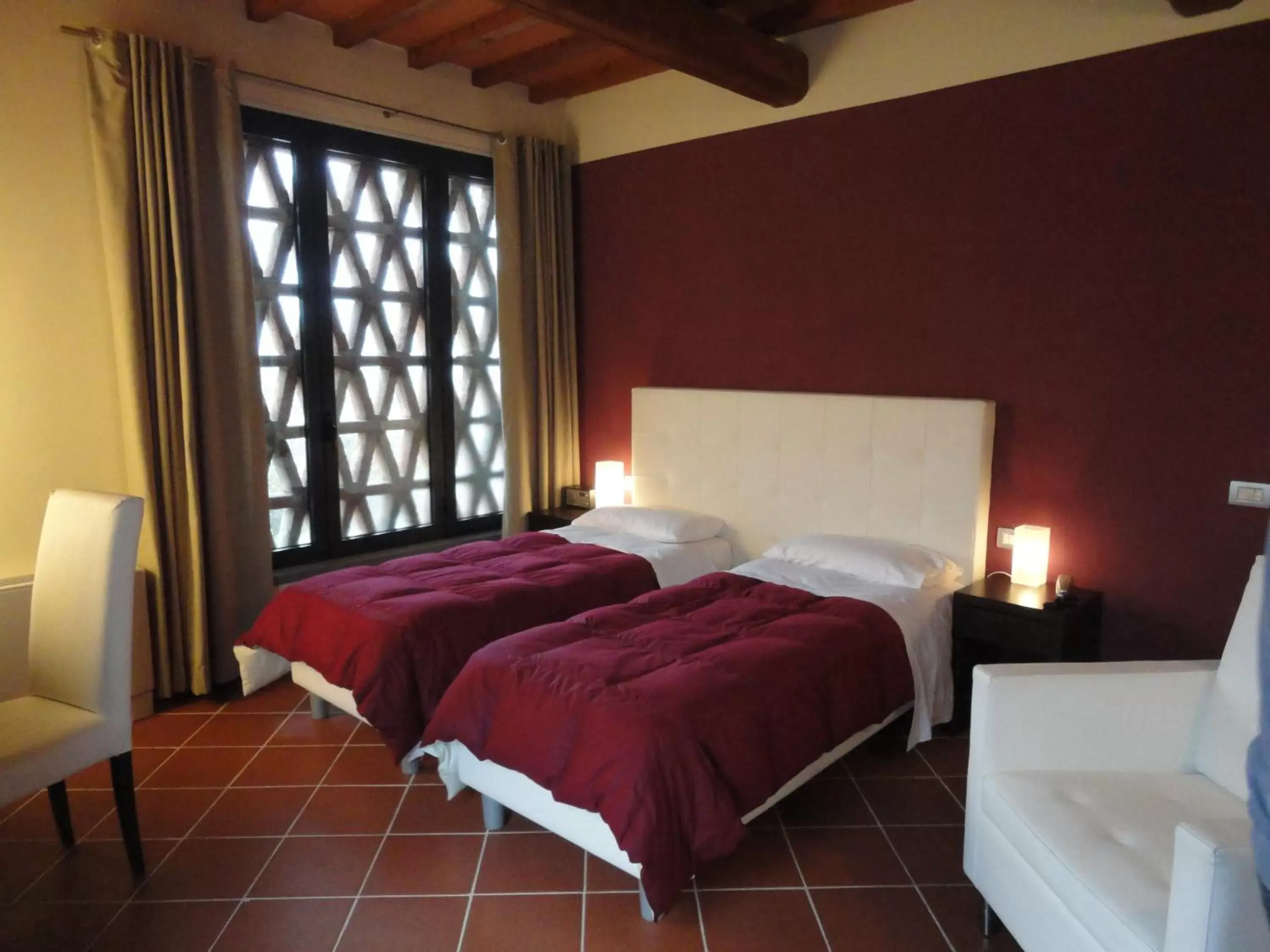 Bed in Il Poggiolo Delle Rose Bed&Breakfast