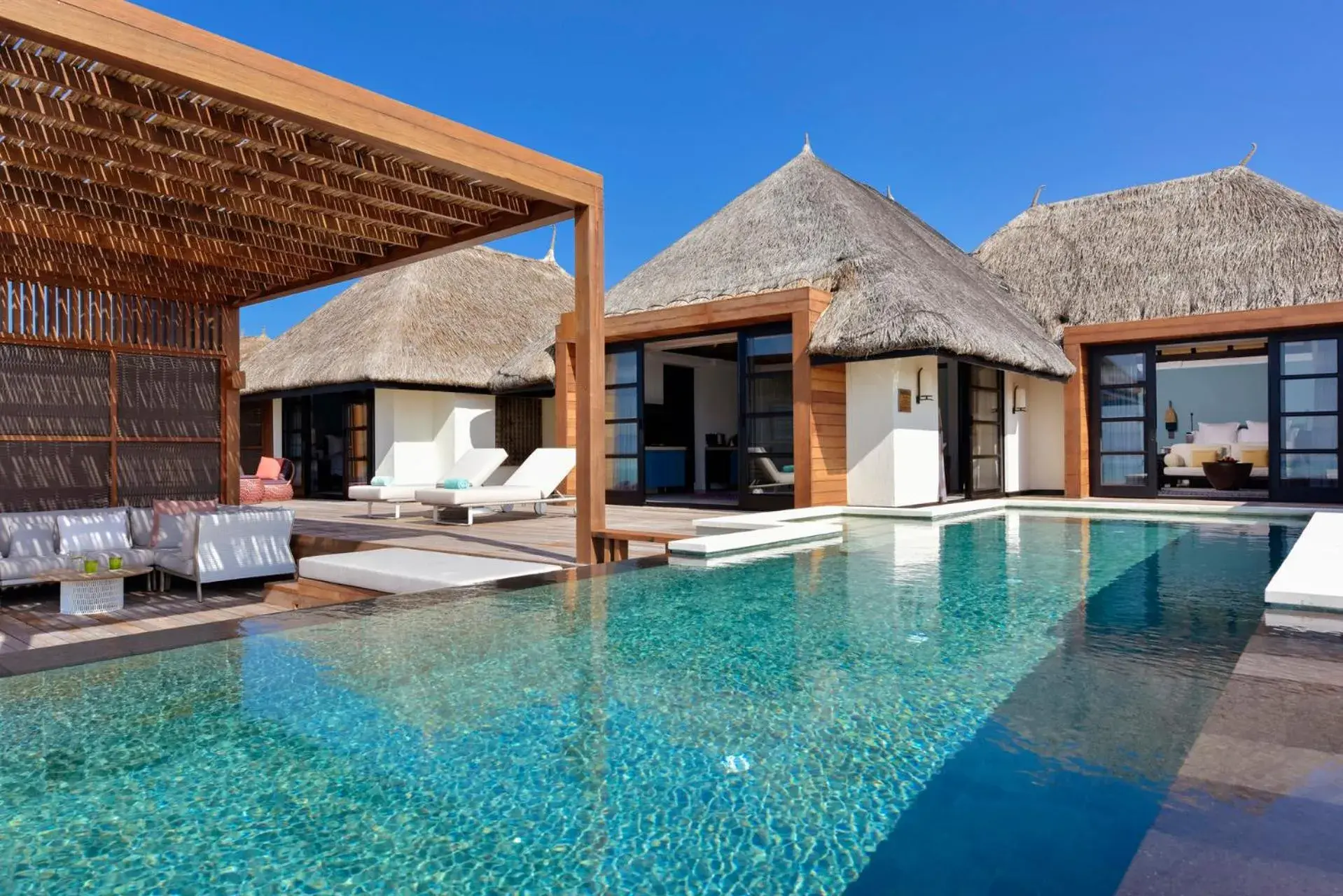 Sea view, Swimming Pool in Four Seasons Resort Maldives at Kuda Huraa