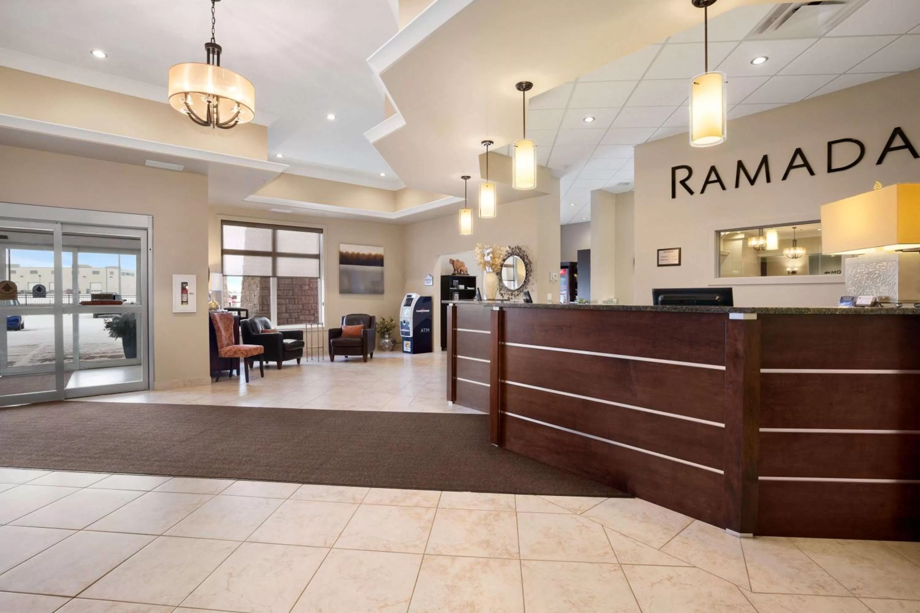 Lobby or reception in Ramada by Wyndham Emerald Park/Regina East