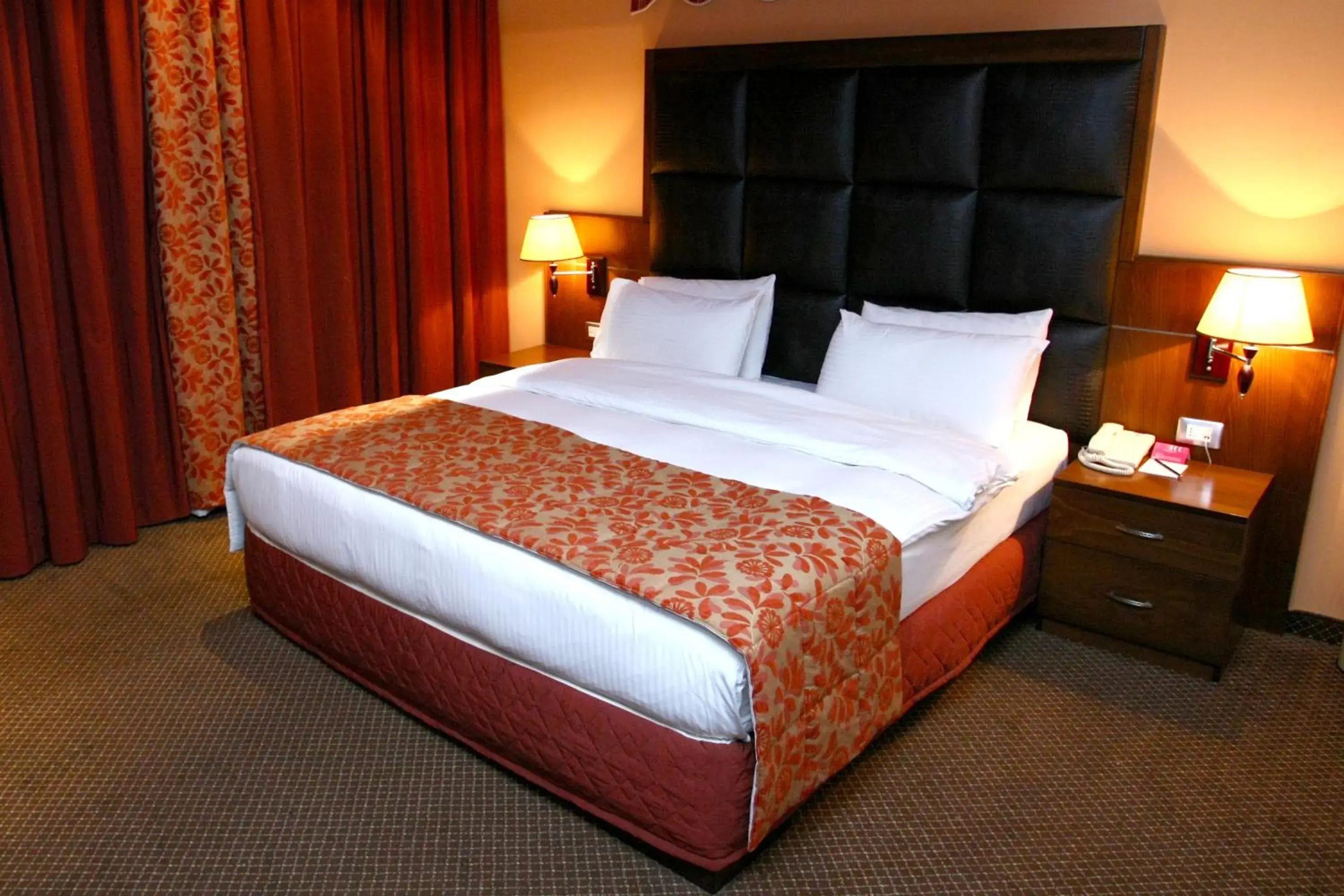 Bed in Markazia Suites