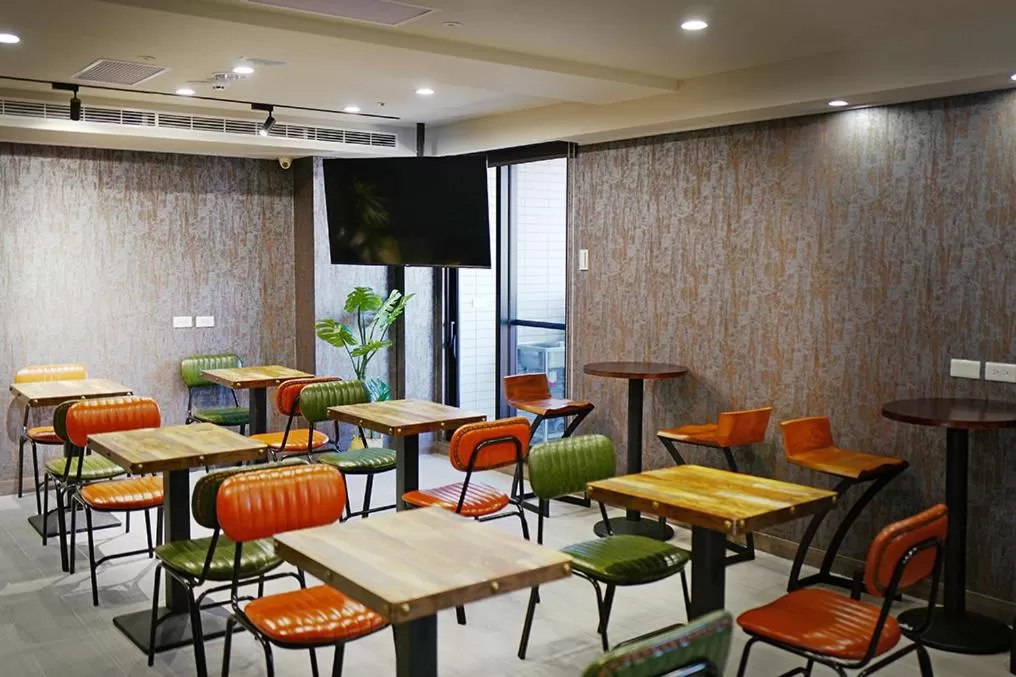 Seating area in Comma Boutique Hotel