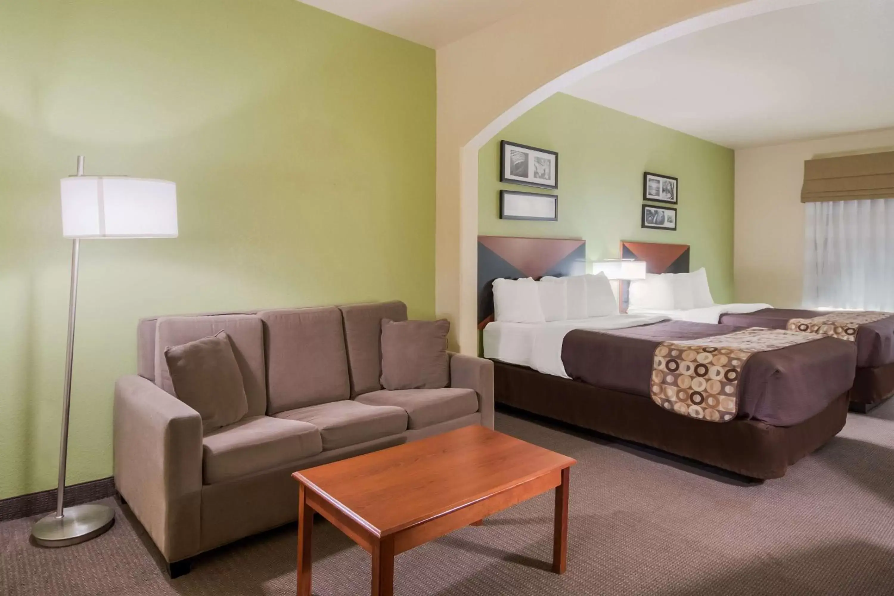 Bedroom in SureStay Plus Hotel by Best Western Near SeaWorld San Antonio