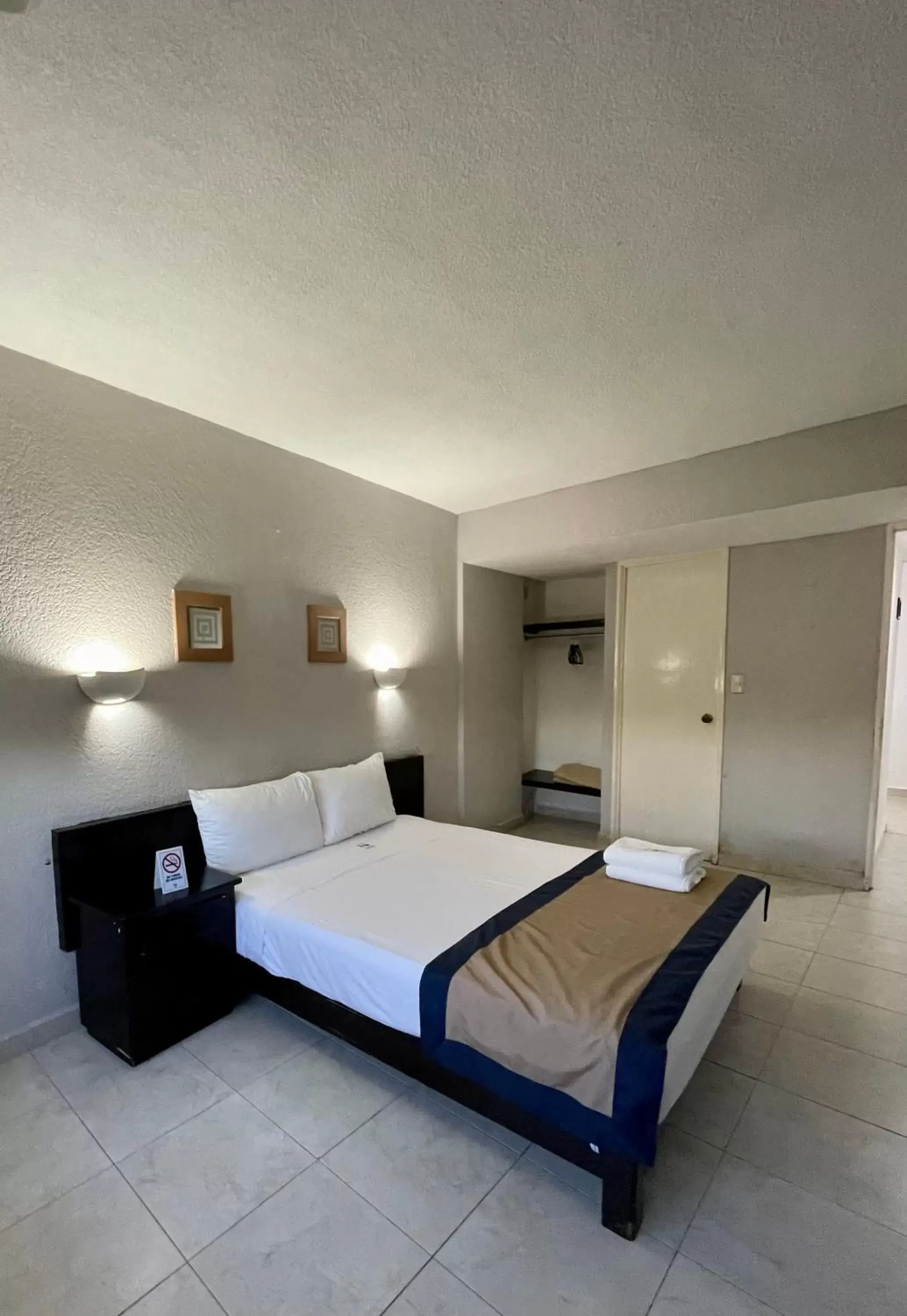 Bed in Hotel Caribe Internacional Cancun