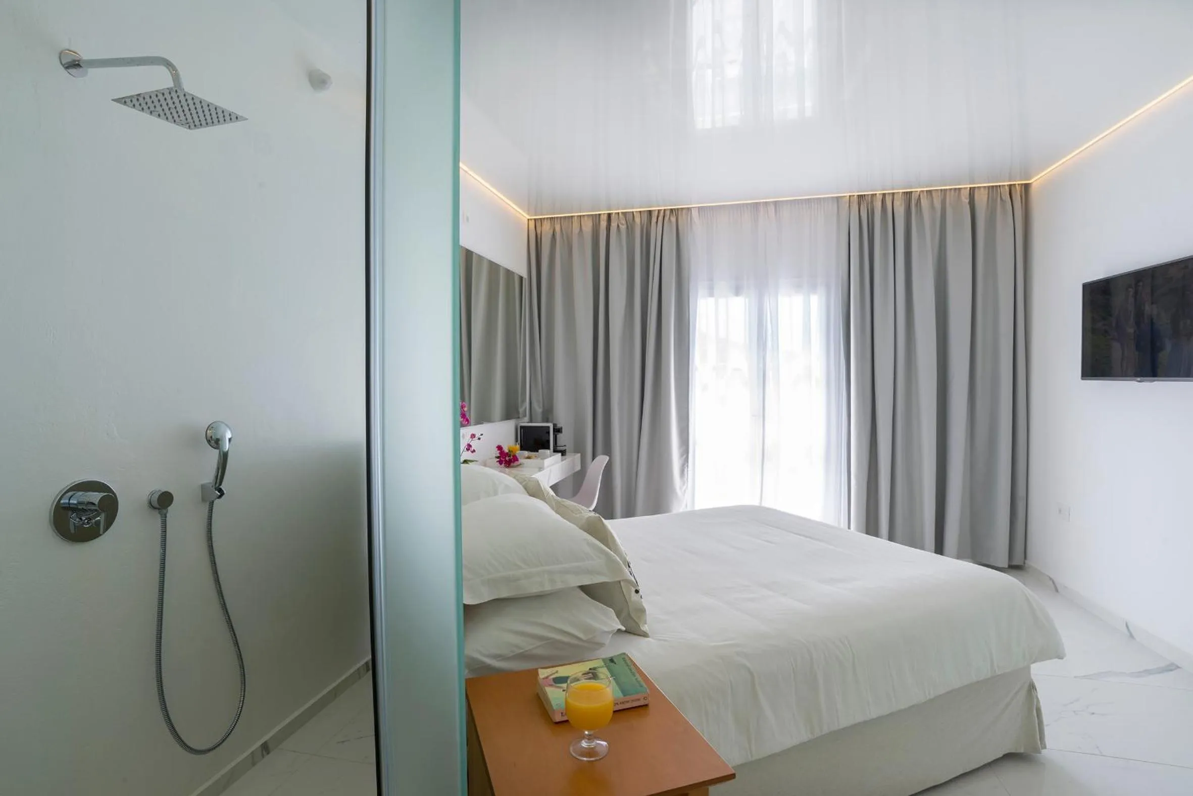 Bed in Dionysos Luxury Hotel Mykonos