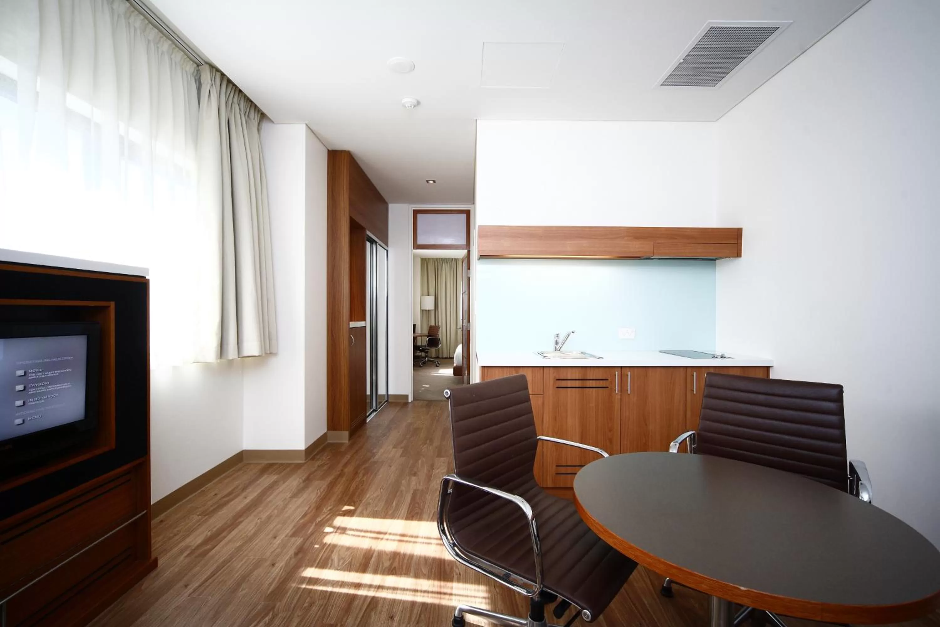 Kitchen or kitchenette in Novotel Canberra