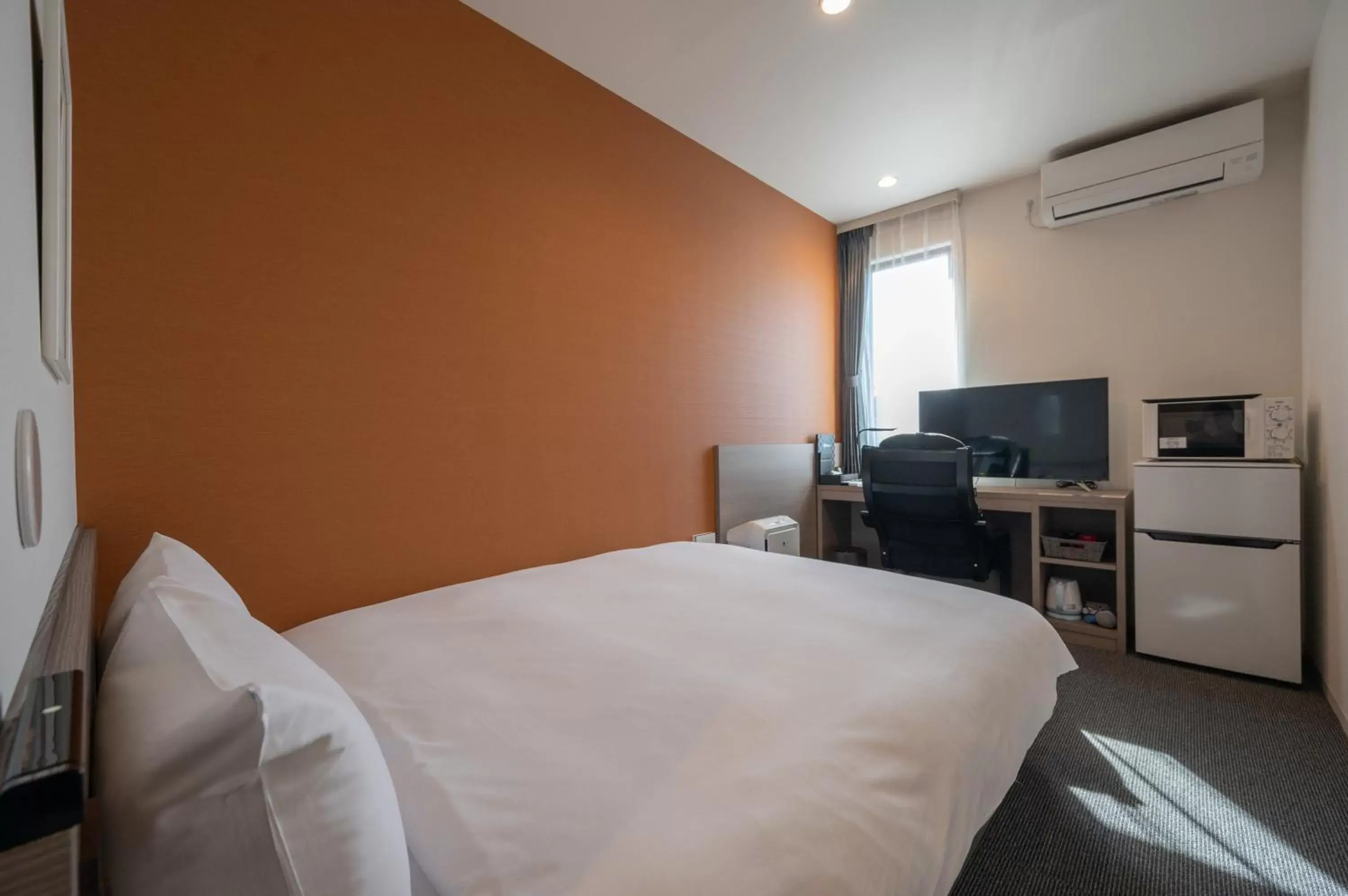 Bed in HOTEL R9 The Yard Futtsu