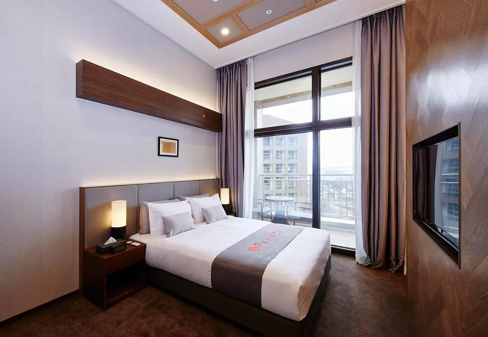 Photo of the whole room, Bed in Pyeongchang Ramada Hotel & Suite by Wyndham