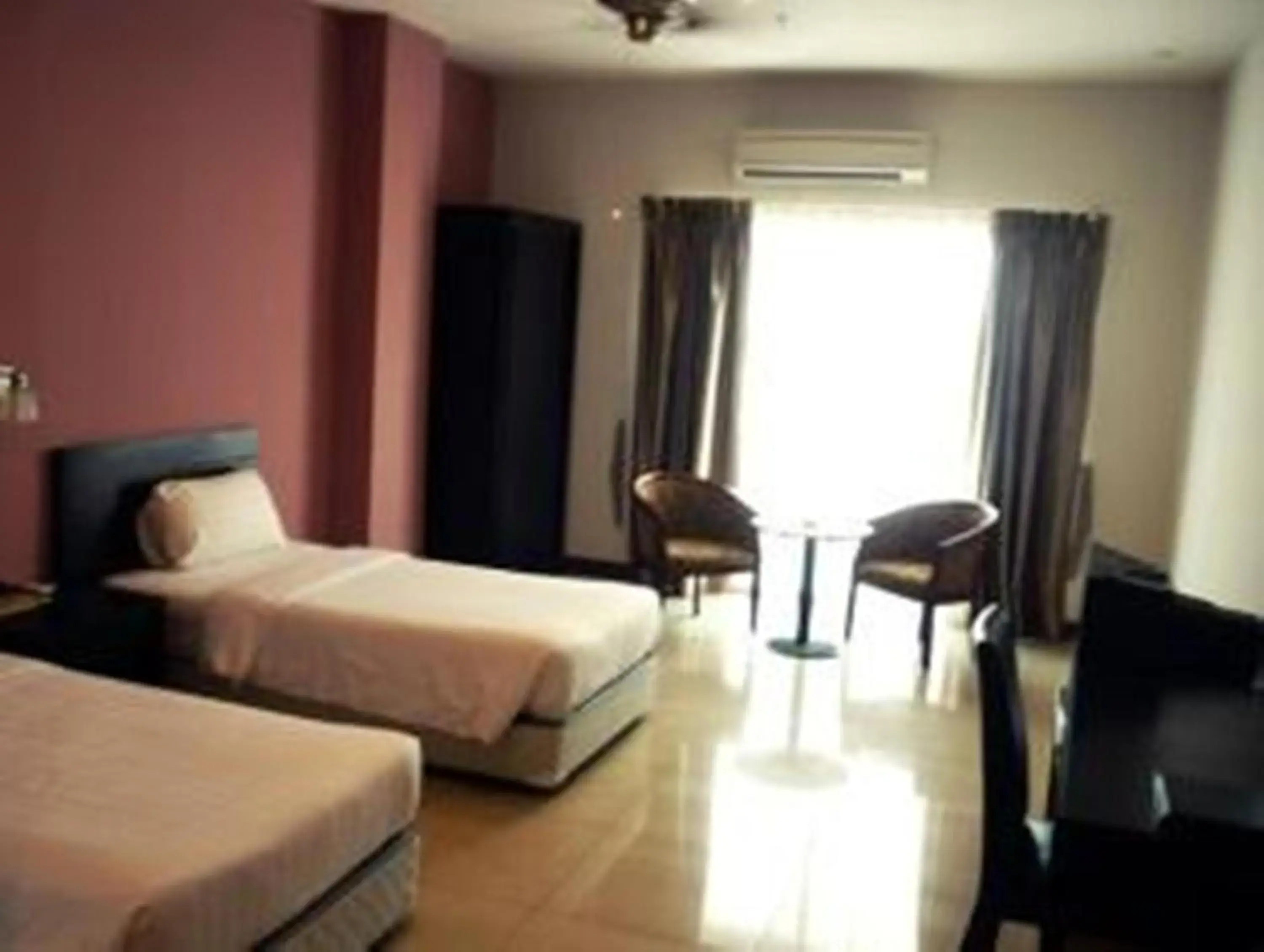 Bedroom, Bed in Tower Regency Hotel & Apartments