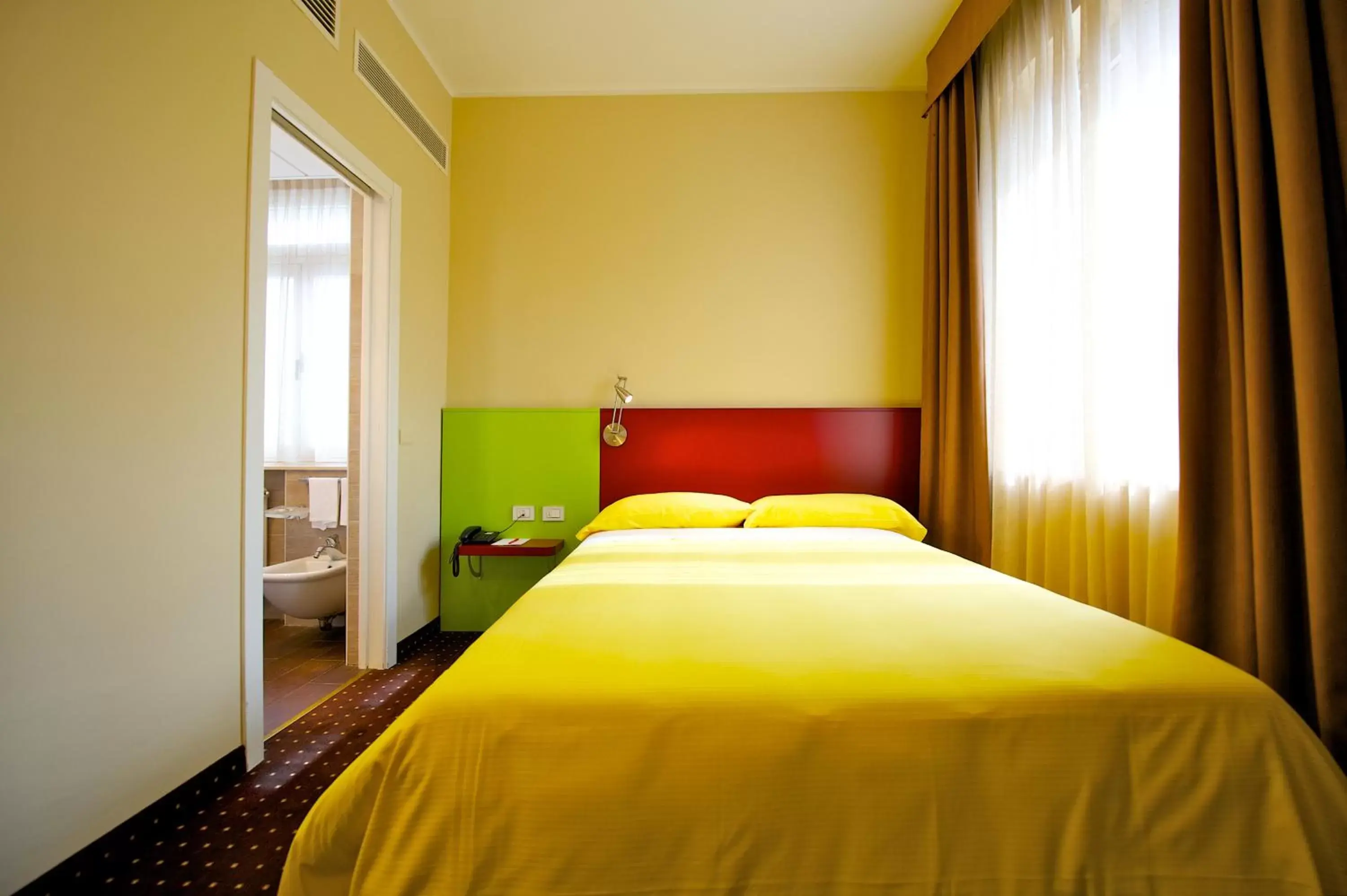 Bedroom, Bed in Ibis Styles Parma Toscanini
