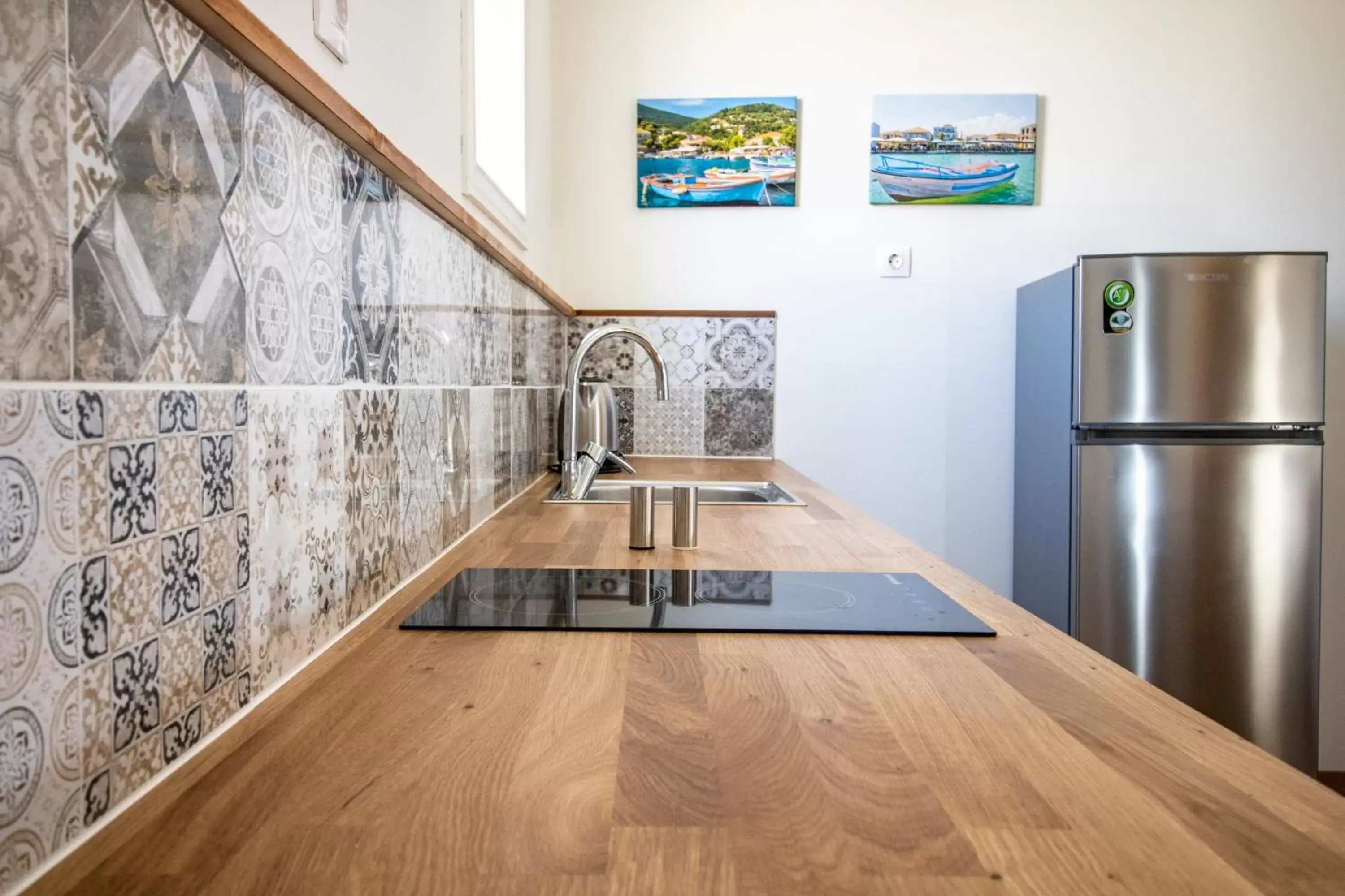 Kitchen or kitchenette in Levkosh Apartments at Lefkada's Heart