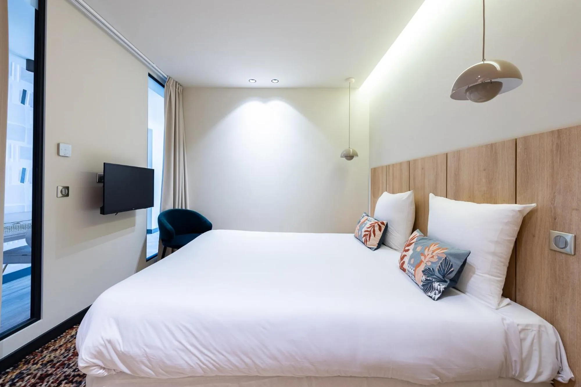 Bed in Florella Croisette Apartment