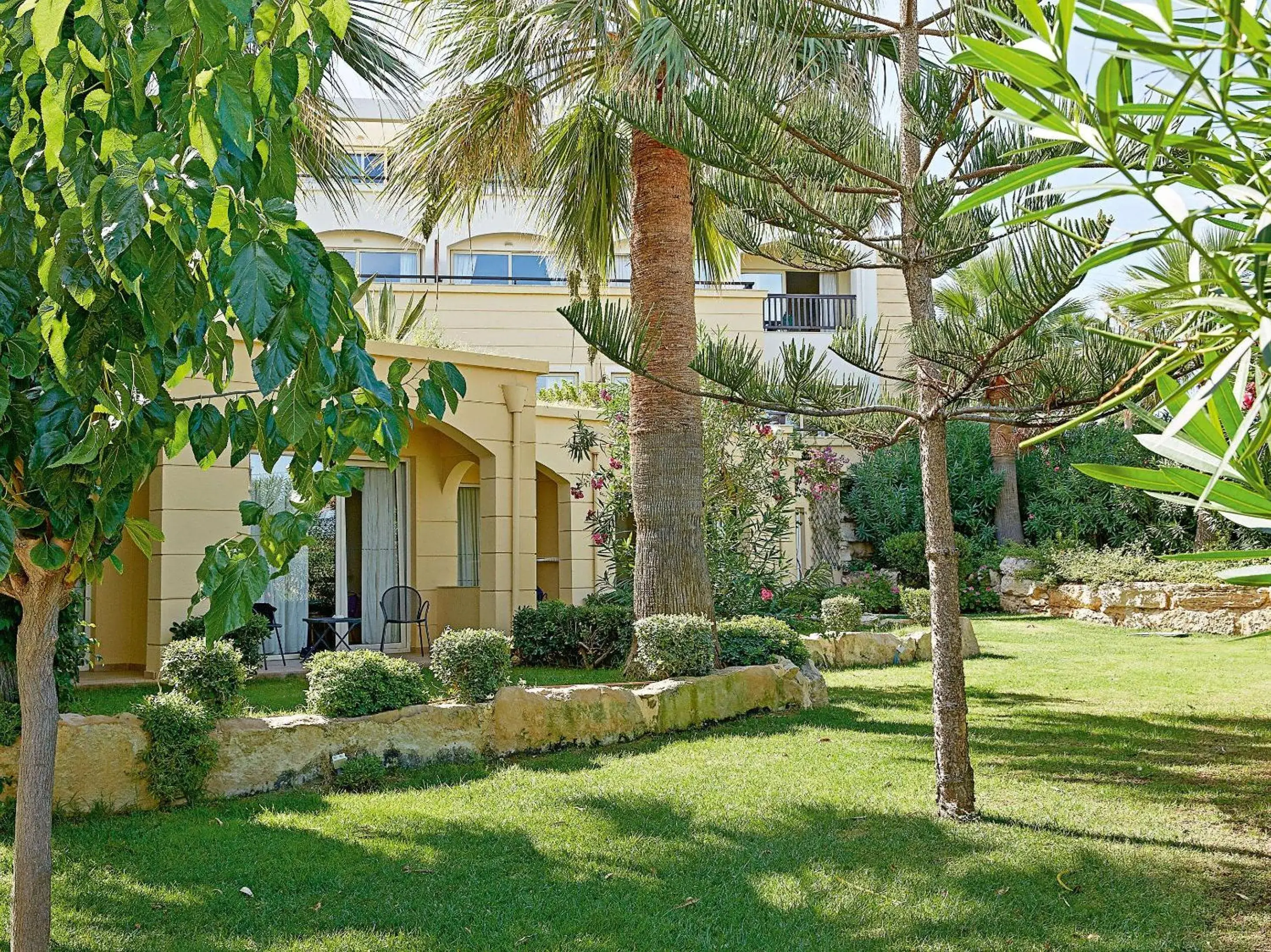 Bedroom, Property Building in Grecotel Marine Palace & Aqua Park