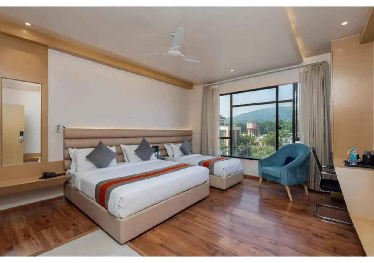 Bedroom in Hotel Arihant By DLS Hotels Bedroom in Hotel Arihant By DLS Hotels