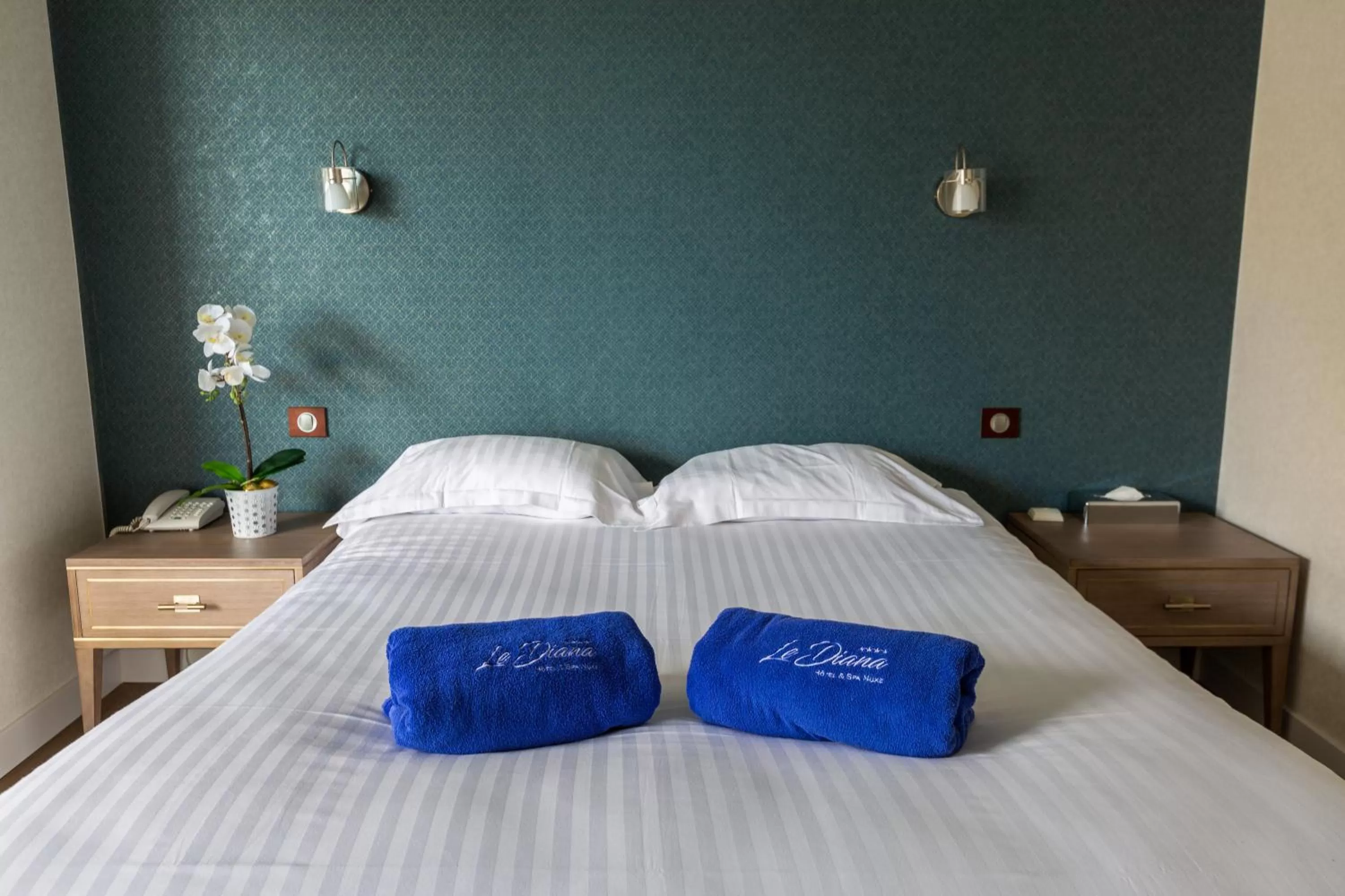 Bed in Le Diana Hôtel & Spa