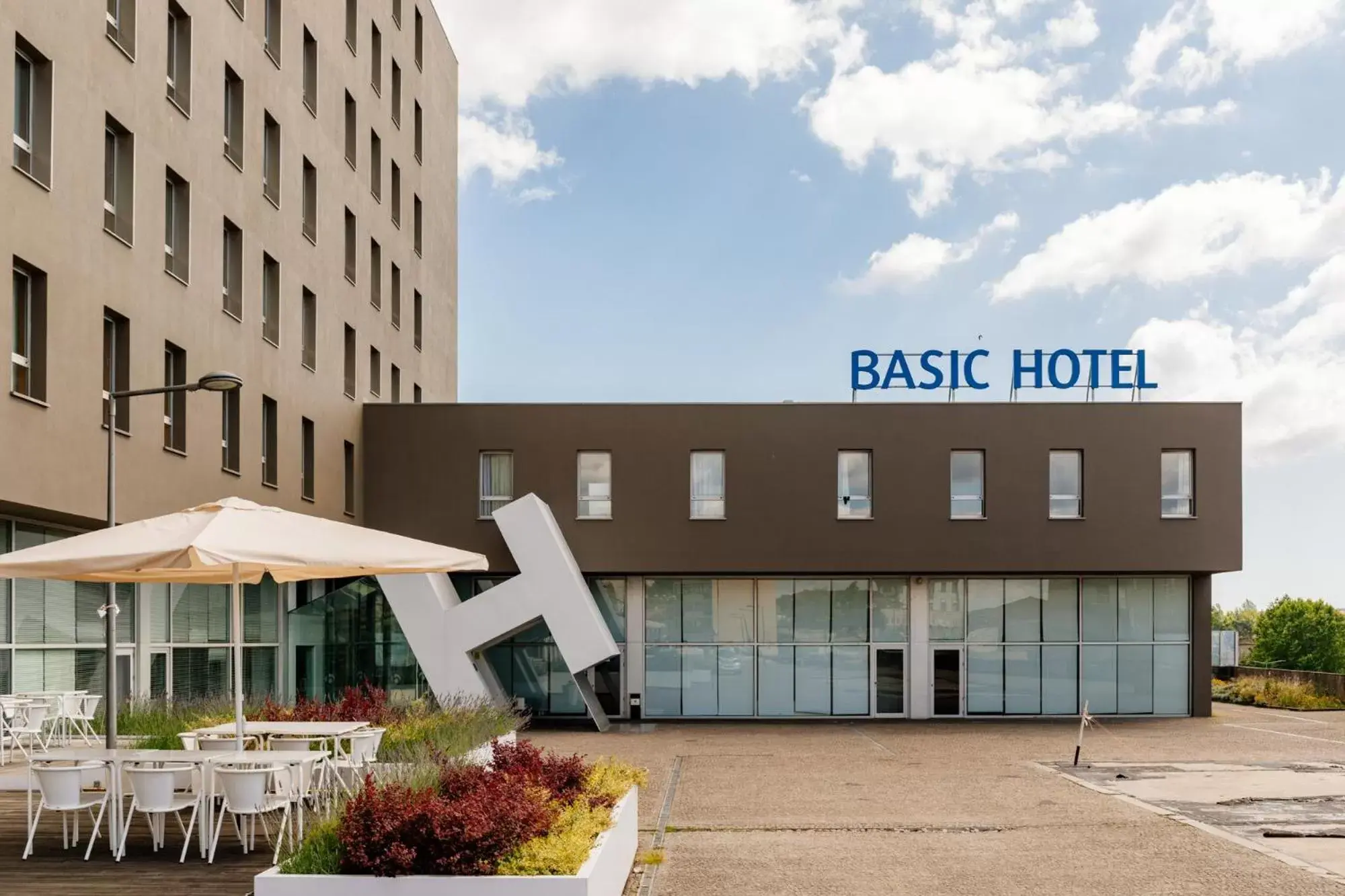 Facade/entrance, Property Building in Basic Braga by Axis