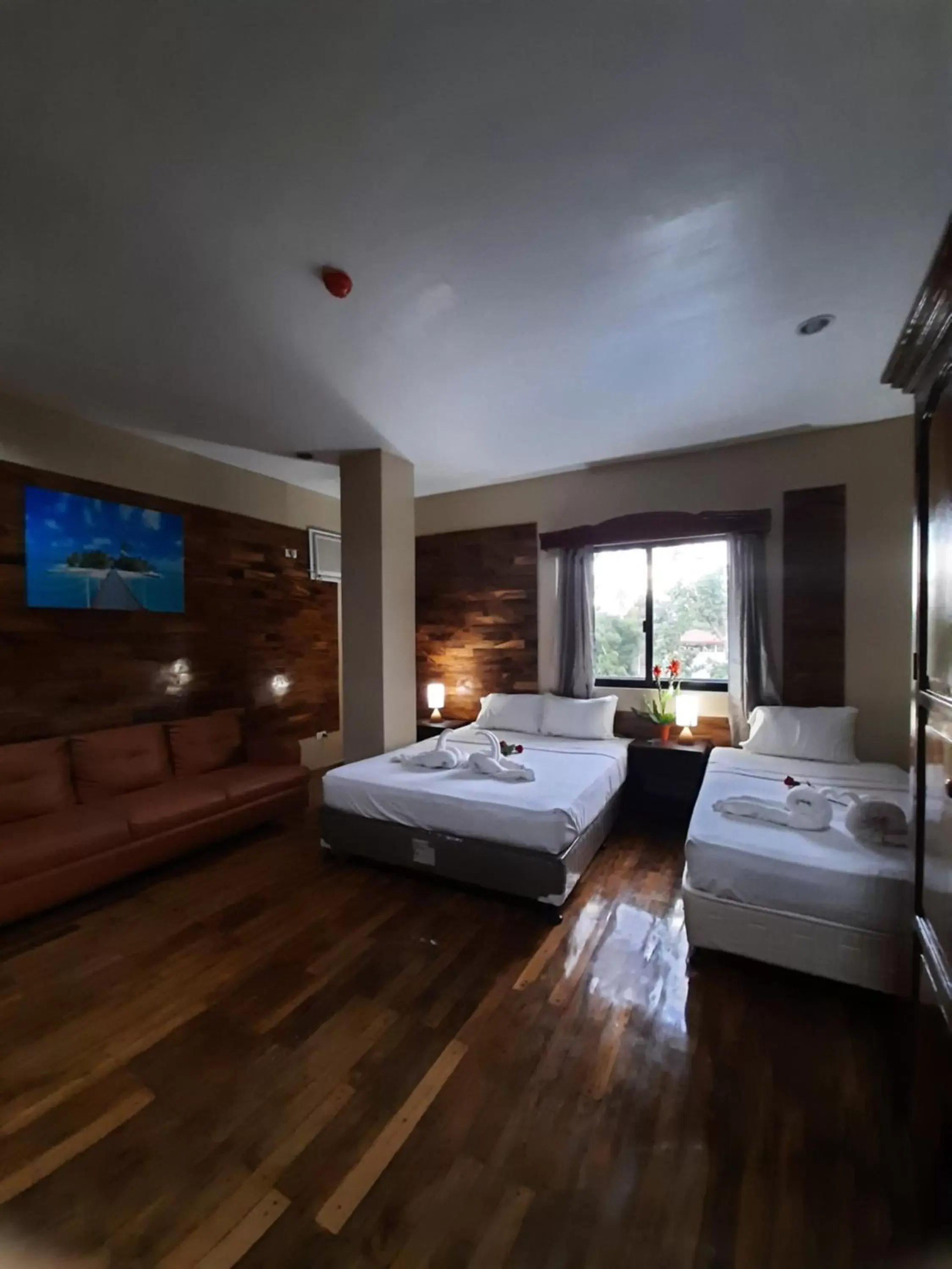 Bed in Mabini Hotel Bed in Mabini Hotel