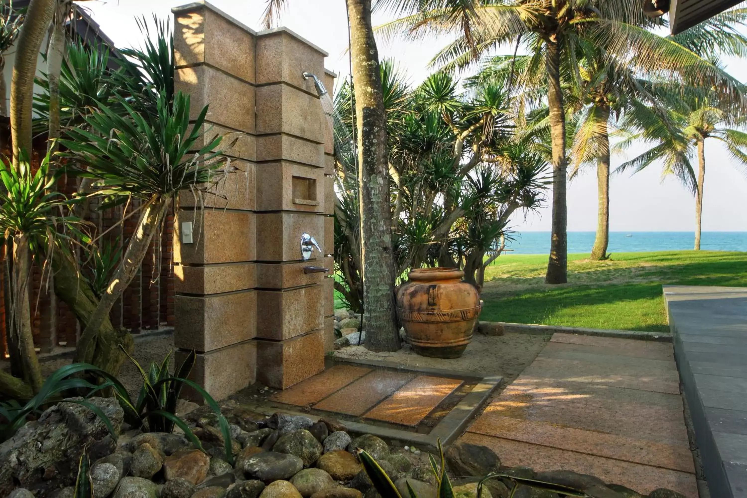 Shower, Garden in Palm Garden Beach Resort & Spa