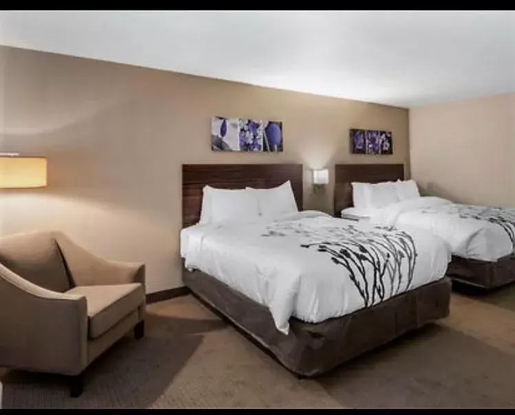 Bed in Sleep Inn & Suites Denver International Airport