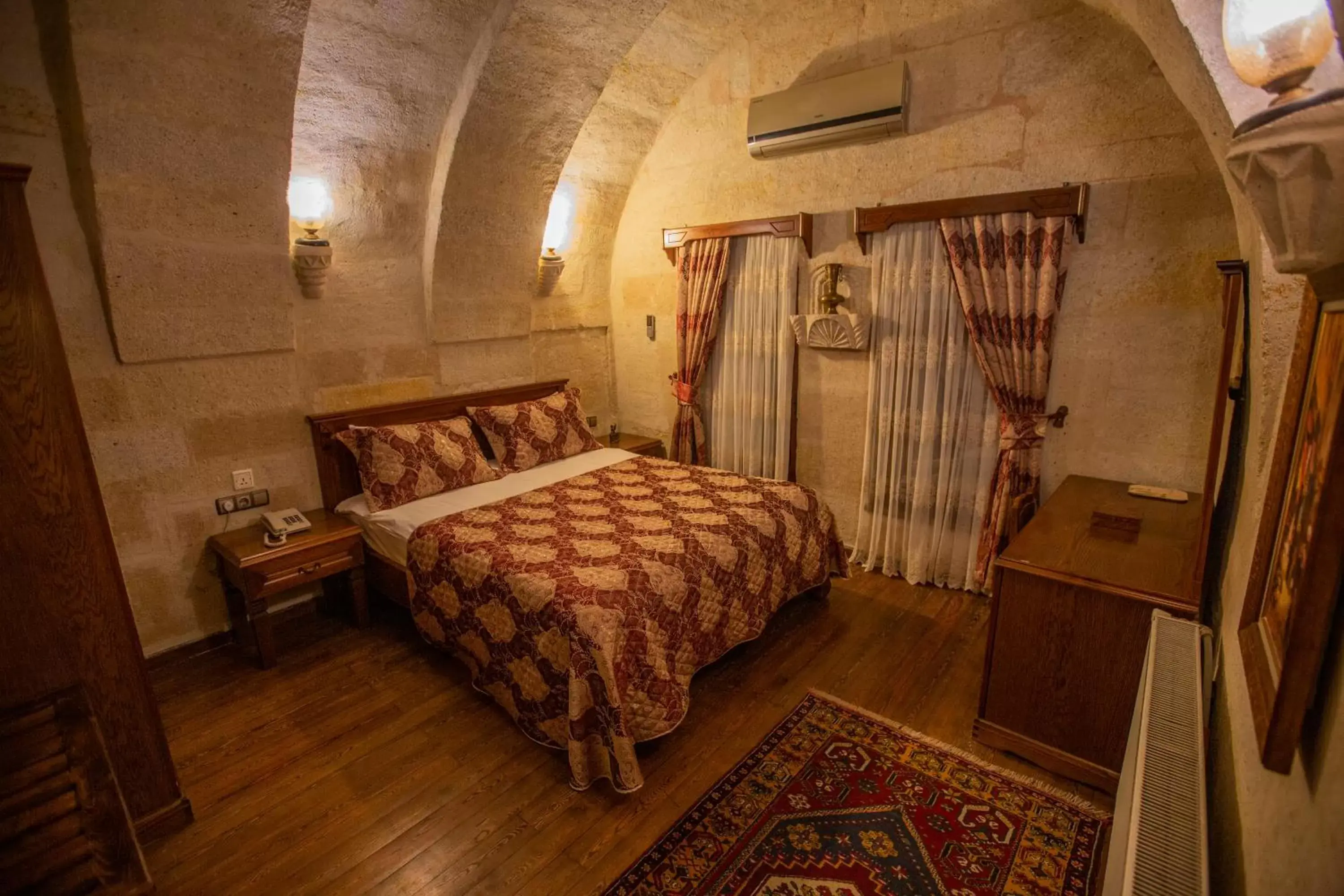 Bedroom, Bed in Stone House Cave Hotel