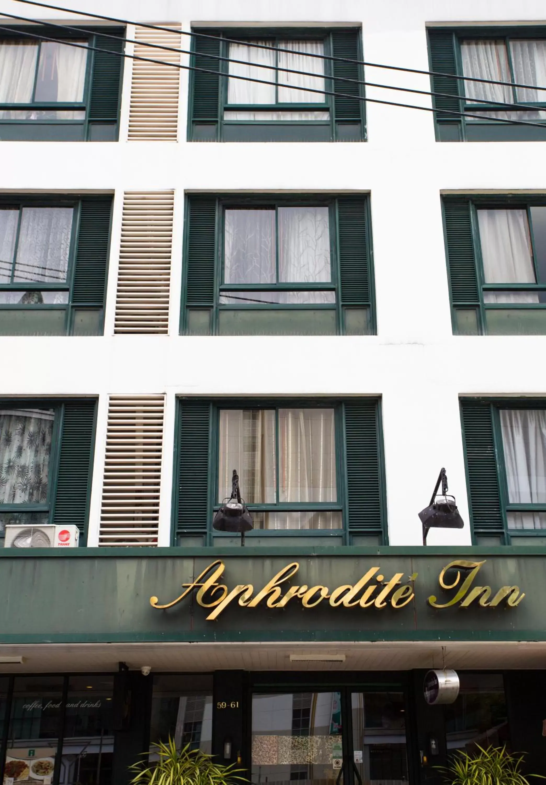 Property building in Aphrodite Inn Bangkok Property building in Aphrodite Inn Bangkok