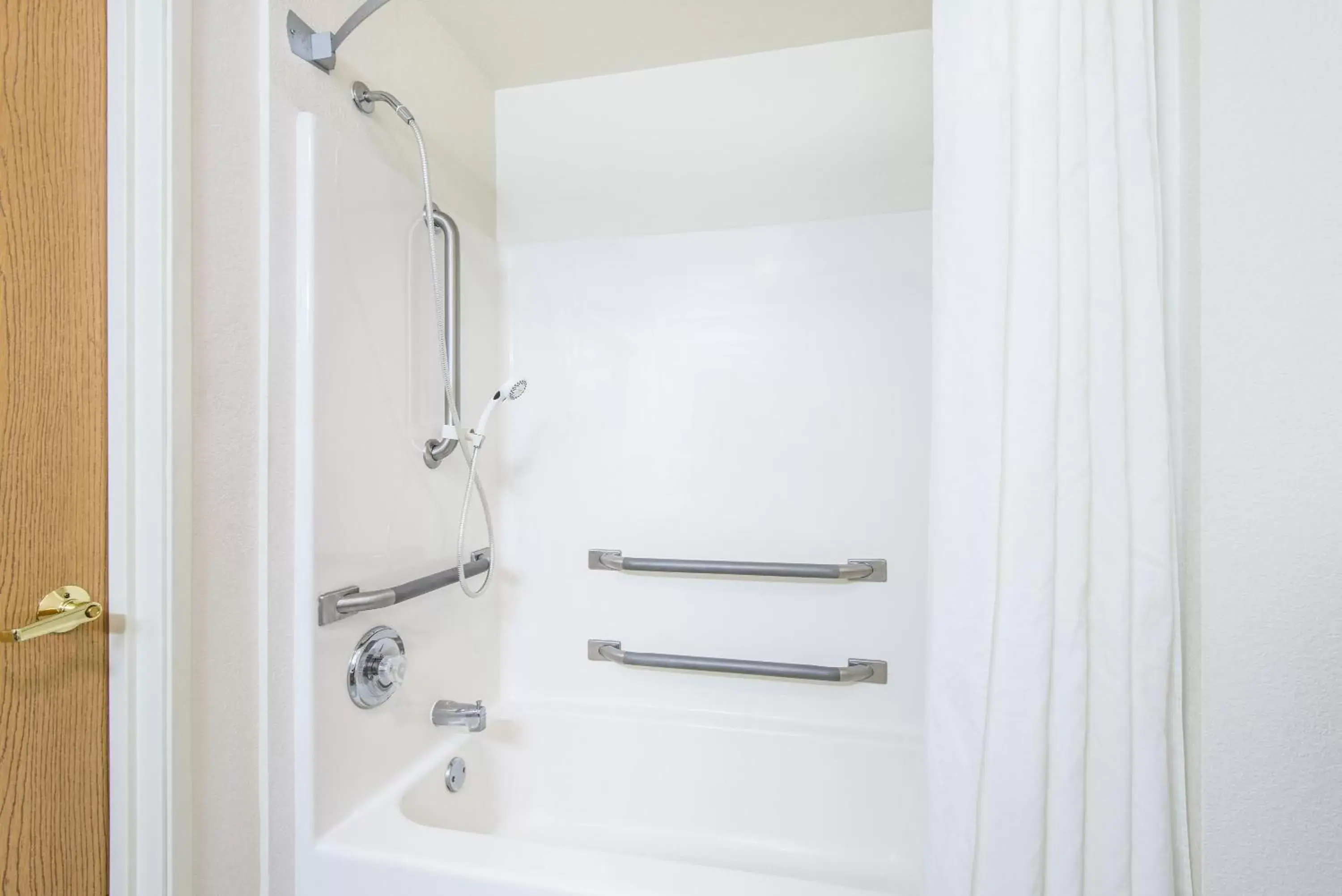 Bathroom in Super 8 by Wyndham West Middlesex/Sharon Area Bathroom in Super 8 by Wyndham West Middlesex/Sharon Area