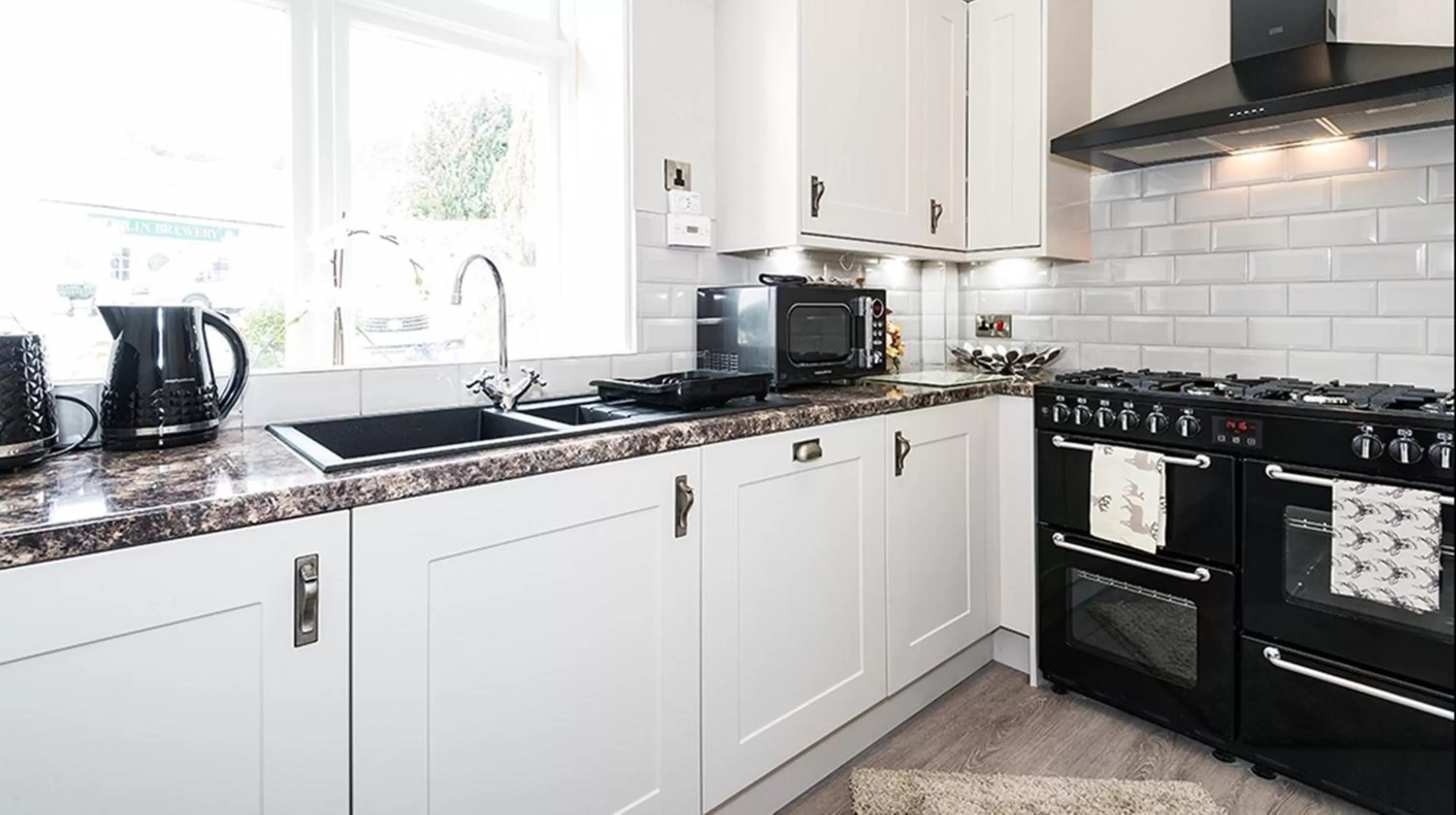 Kitchen or kitchenette in Moulin Hotel