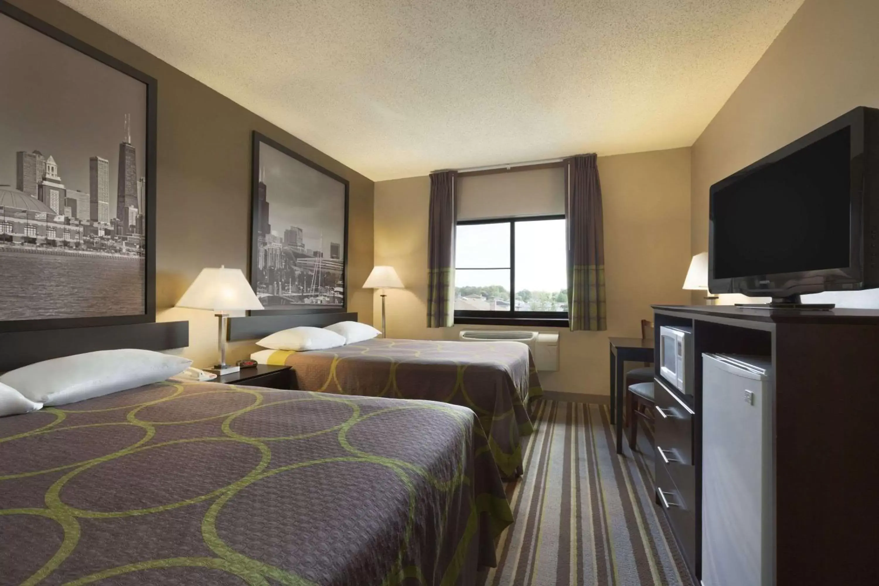 Photo of the whole room, TV/Entertainment Center in Super 8 by Wyndham Bridgeview/Chicago Area