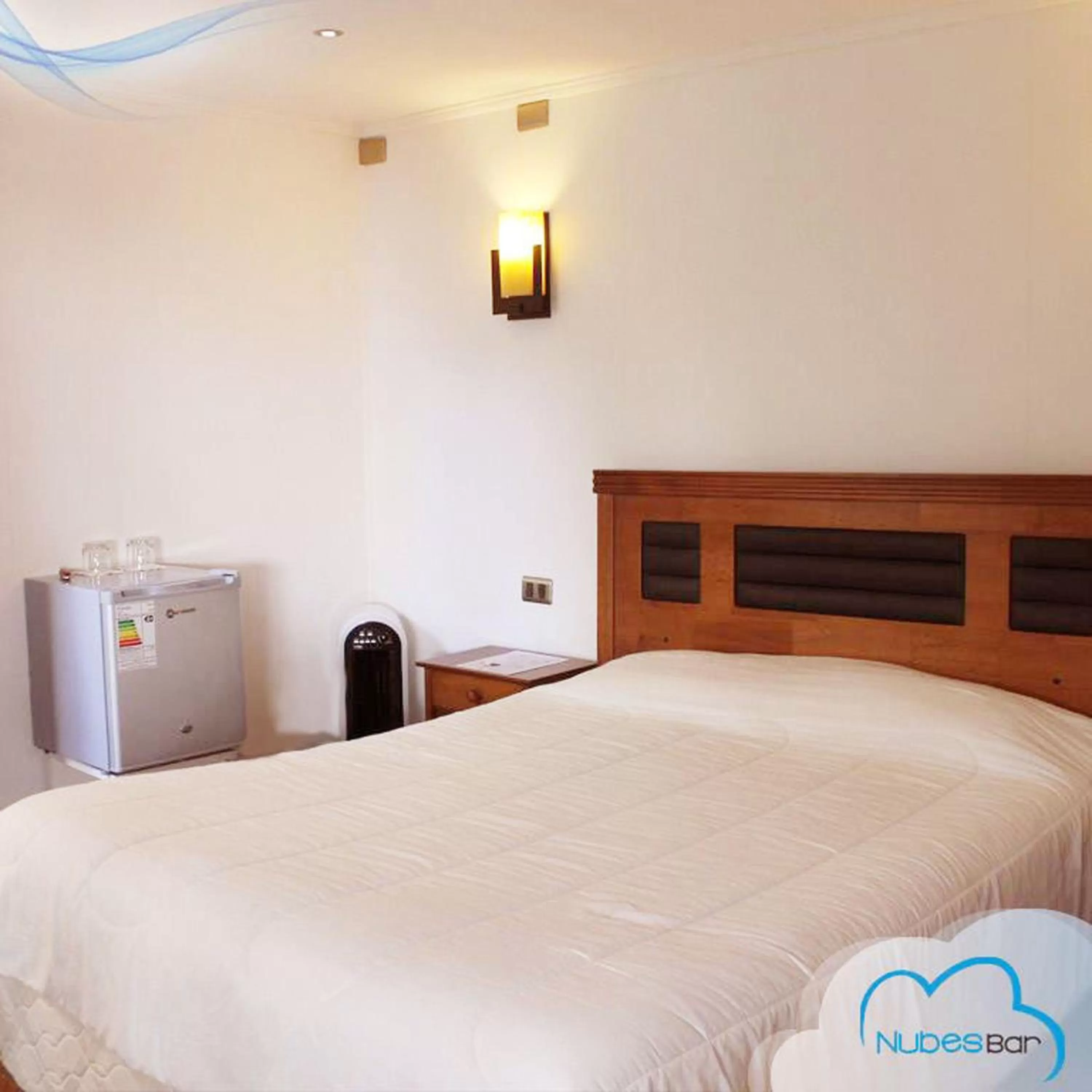 Bed in Nubes Hotel