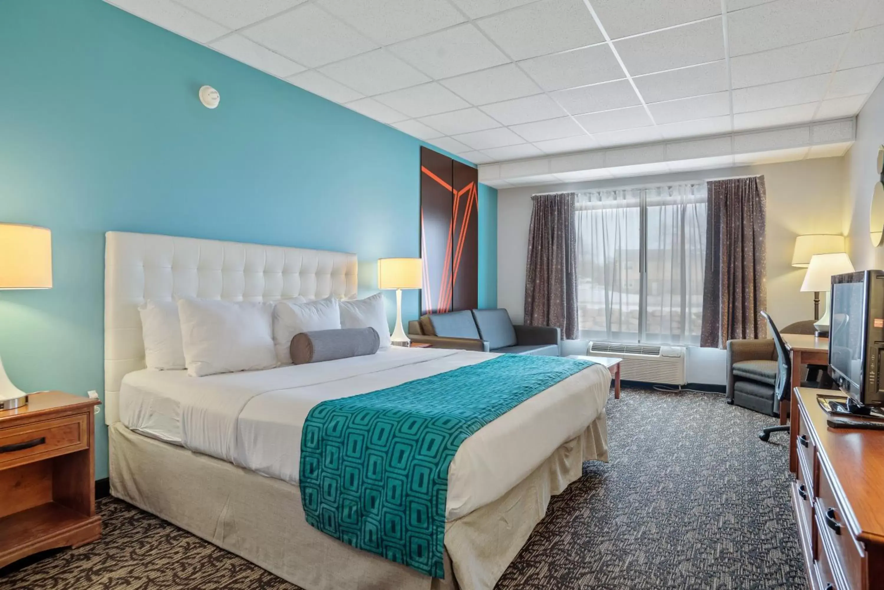 Bed in Howard Johnson by Wyndham Rapid City