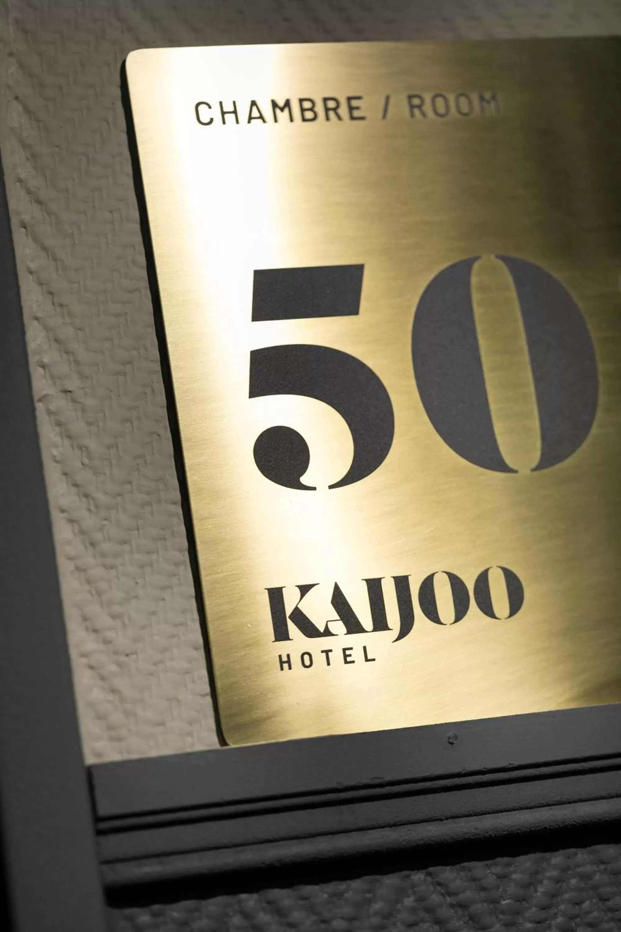 Property logo or sign in Hotel Kaijoo by HappyCulture