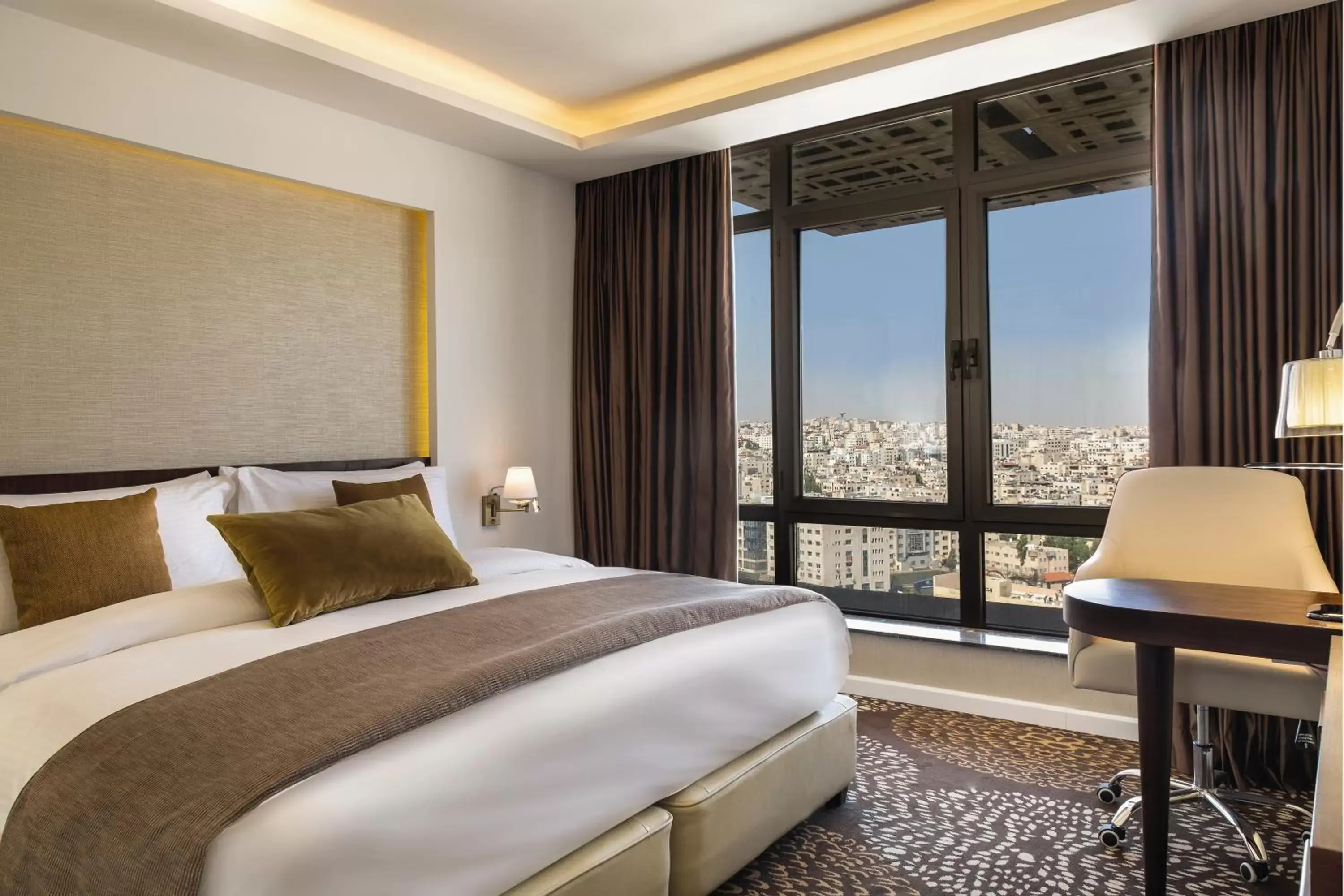 Bed in Mövenpick Hotel Amman